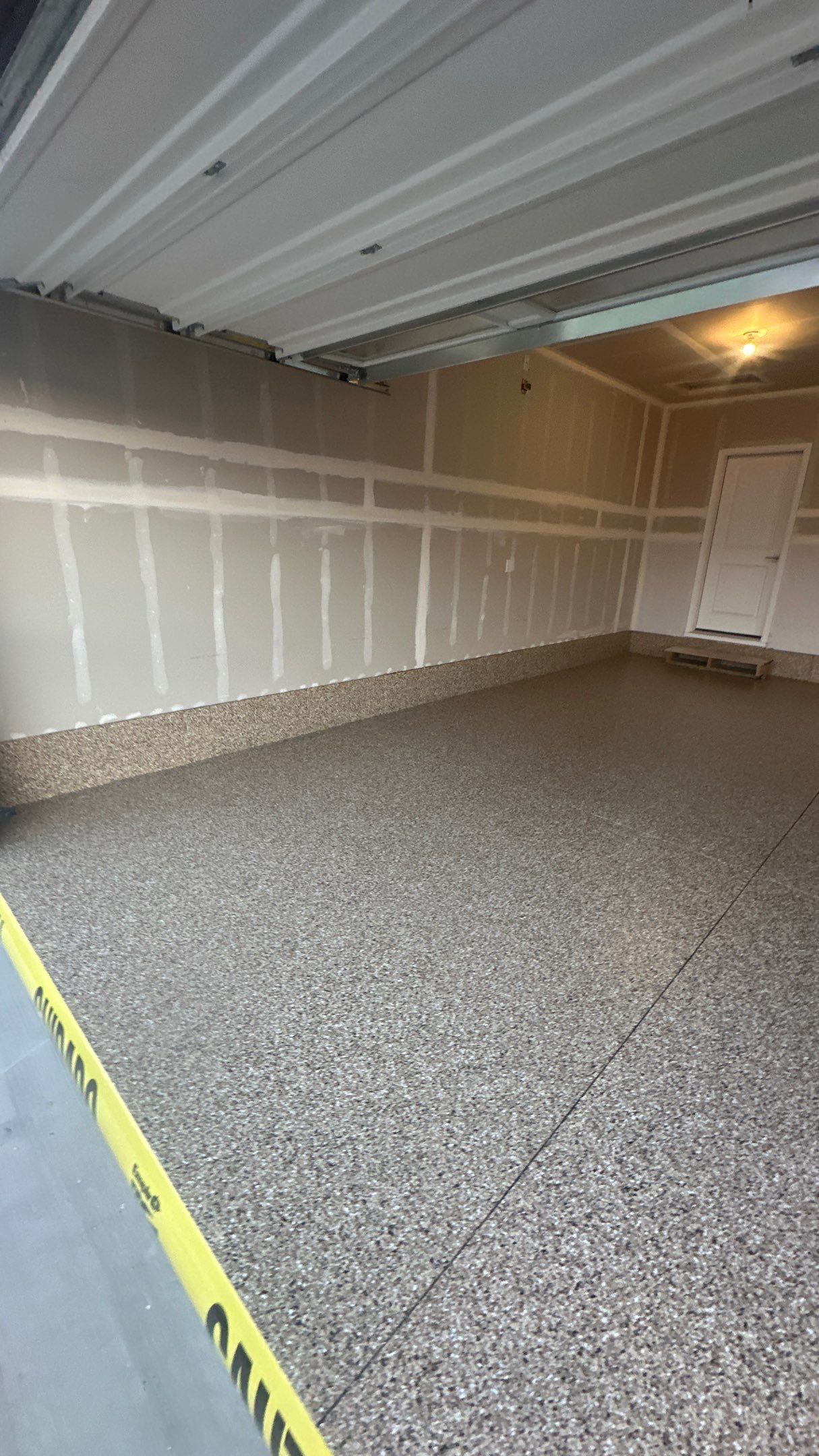 Garage Transformation using Sandstone by Croc Coatings, LLC
