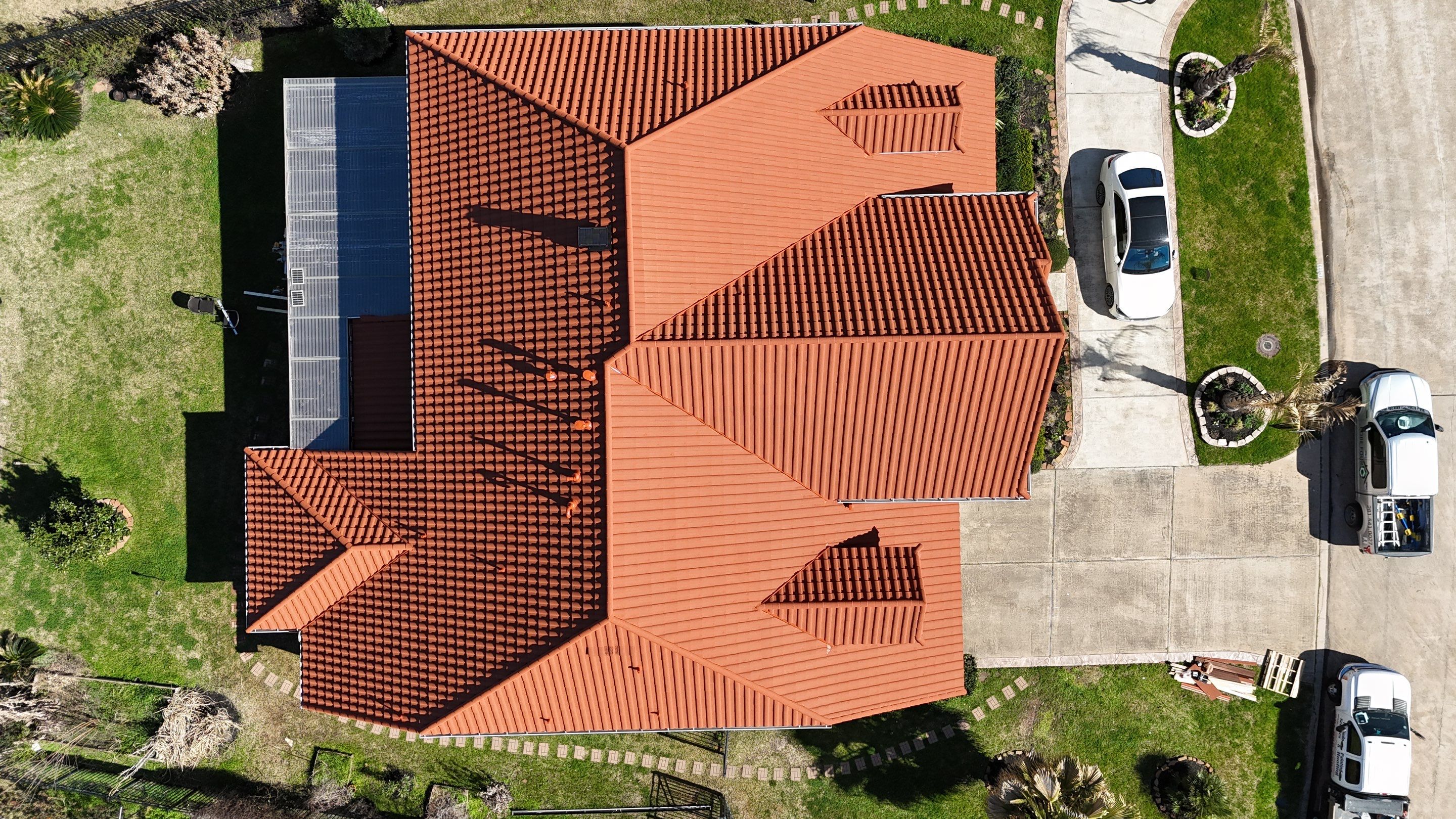 Stunning transformation using DECRA Villa Tile! by Core Four Roofing