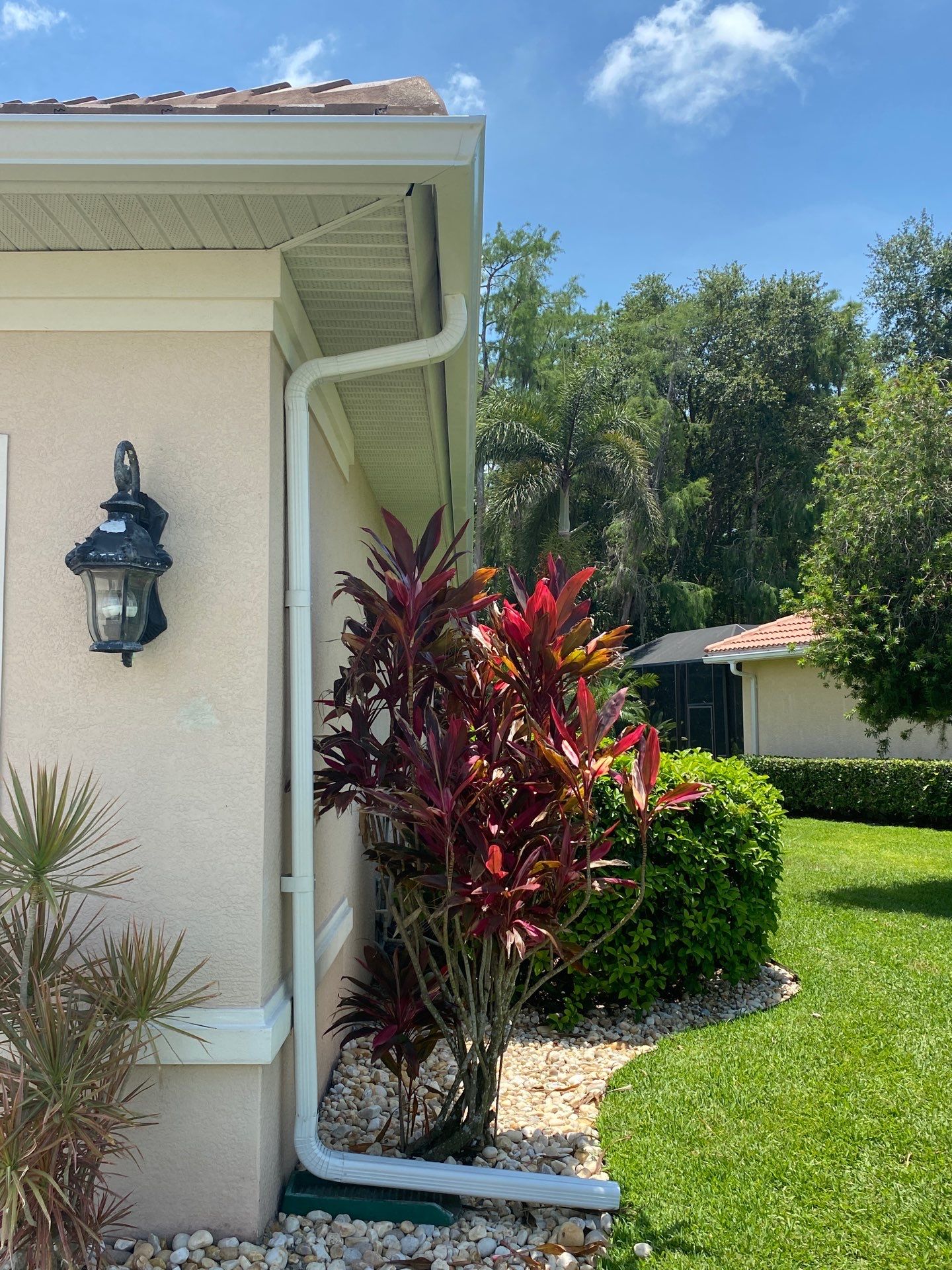 Seamless Gutter Upgrade Before & After in Bonita Springs FL by Gutter Professors