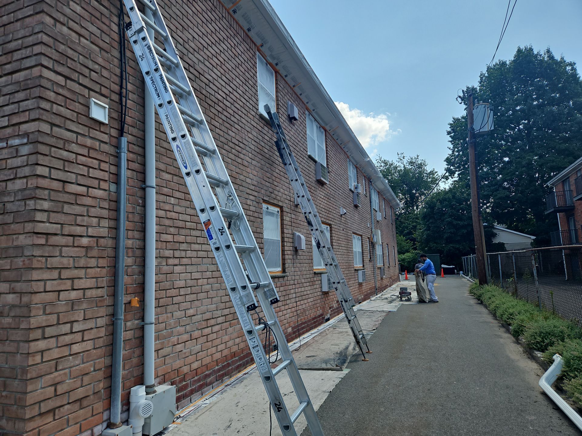 Multi-Unit Apartment Complex Exterior Brick Painting Project in Hackensack by Spectrum Painting, LLC