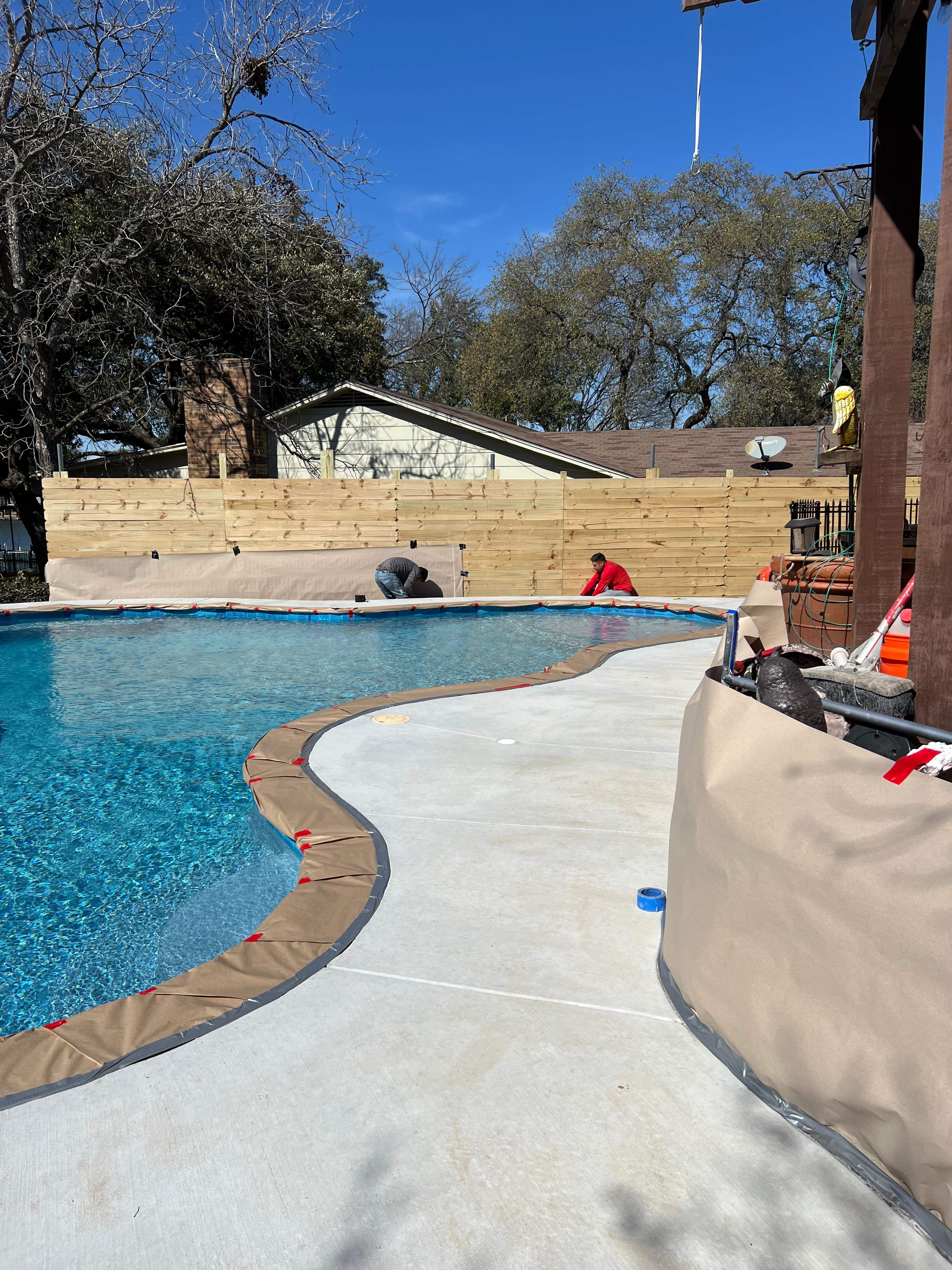 Freeform Pool with Tanning Ledge and Stone Coping by Pinnacle Pools and Spas - DFW