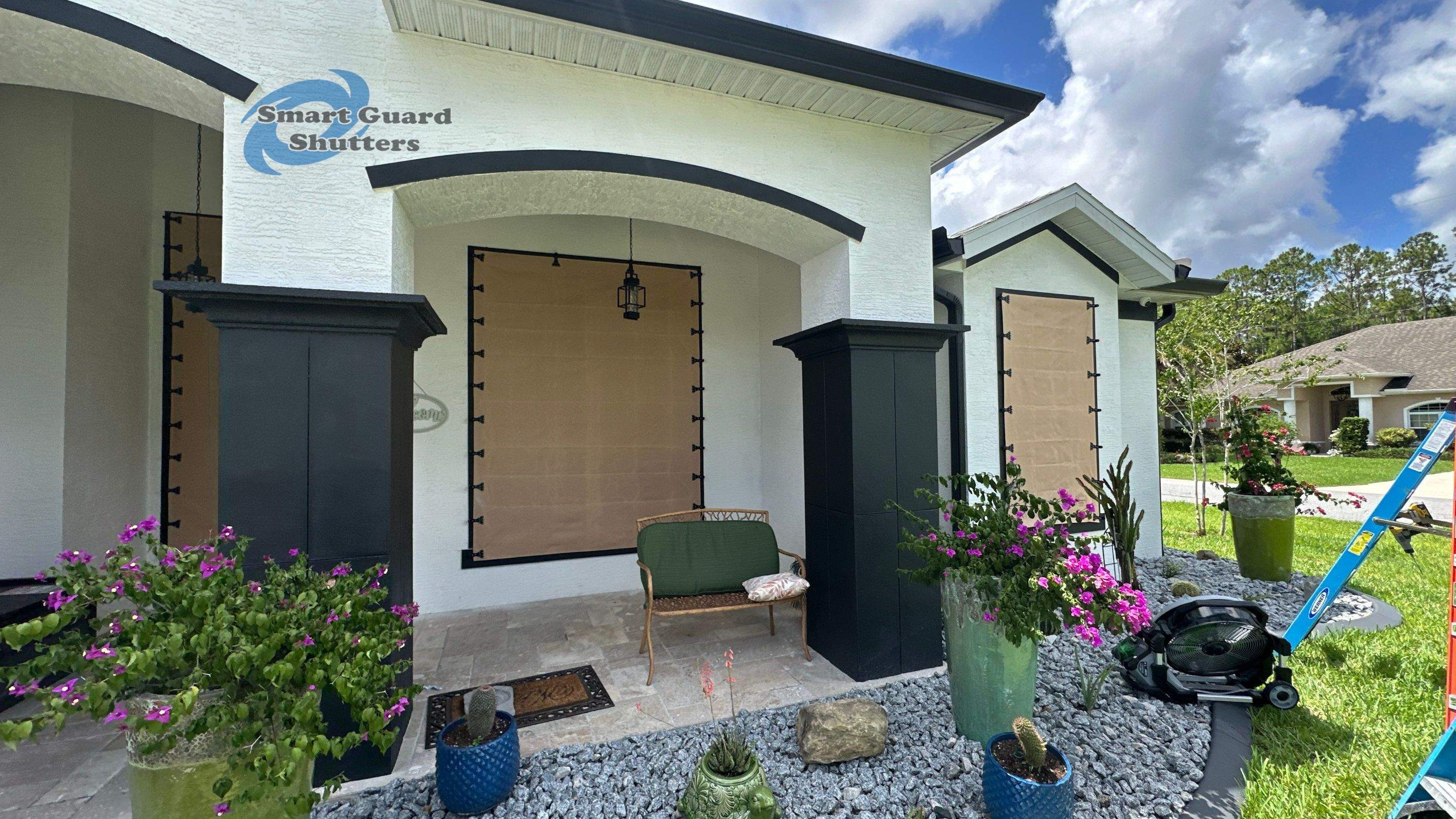 AstroGuard Hurricane Fabric in Tan by Smart Guard Shutters