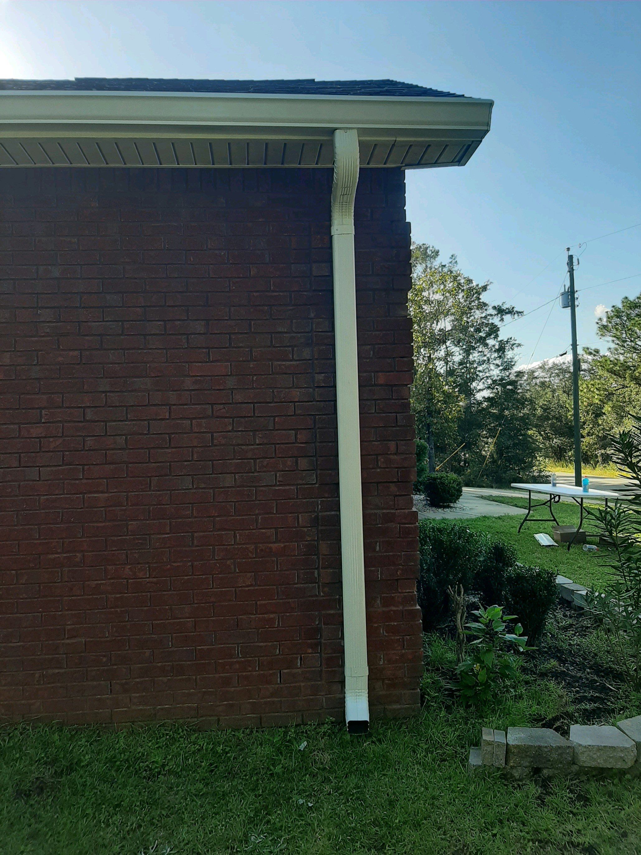 Gutter Installation using White K-Style Seamless Gutters by Gutter Professors