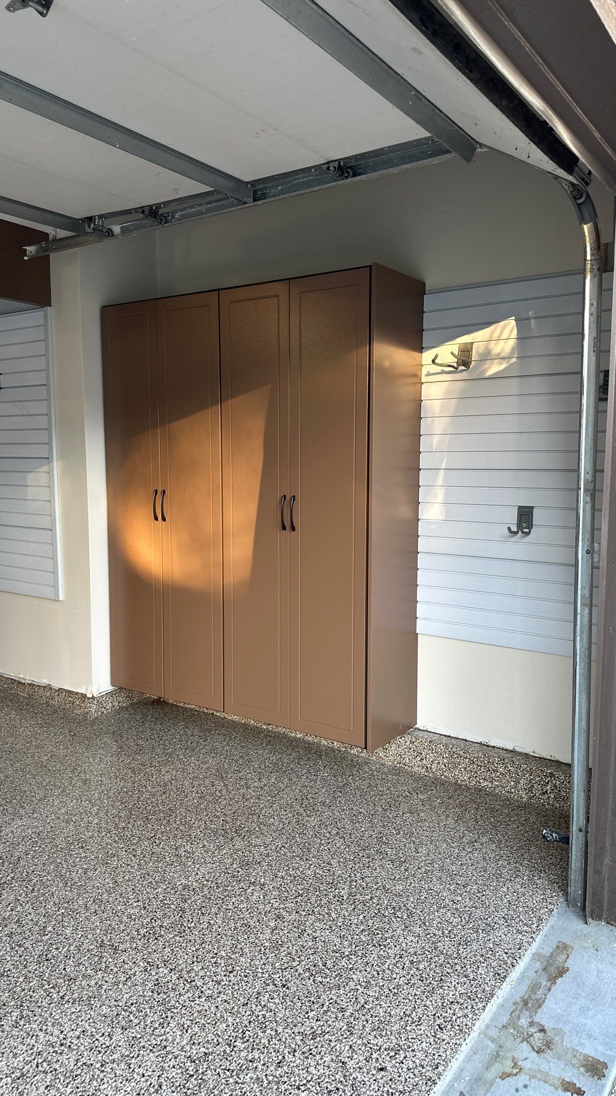 Jake P upgraded his garage with brand new cabinets and a new floor  by Banner Garage