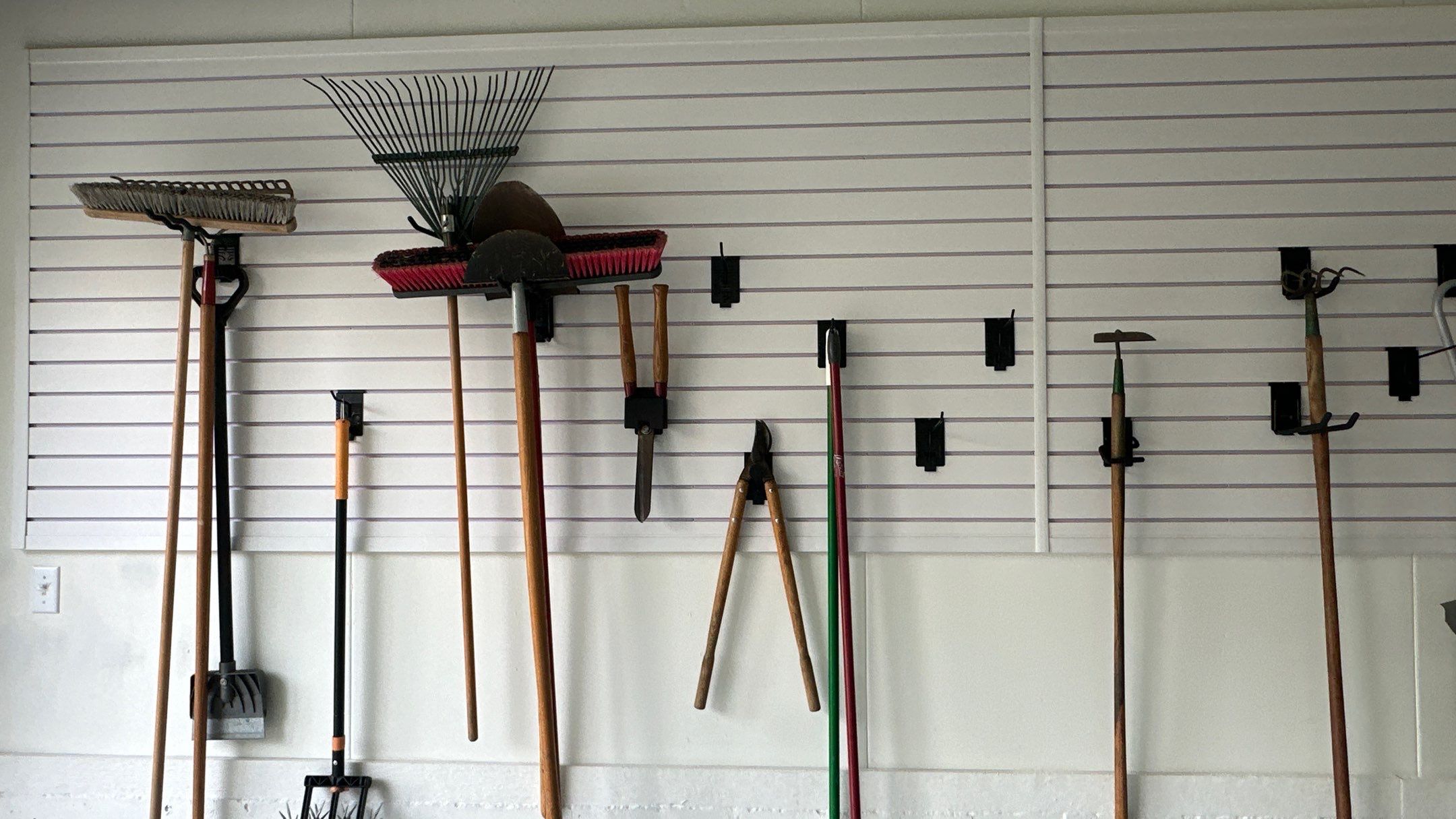 Steve L. went with brite white slotwall in his garage by Banner Garage