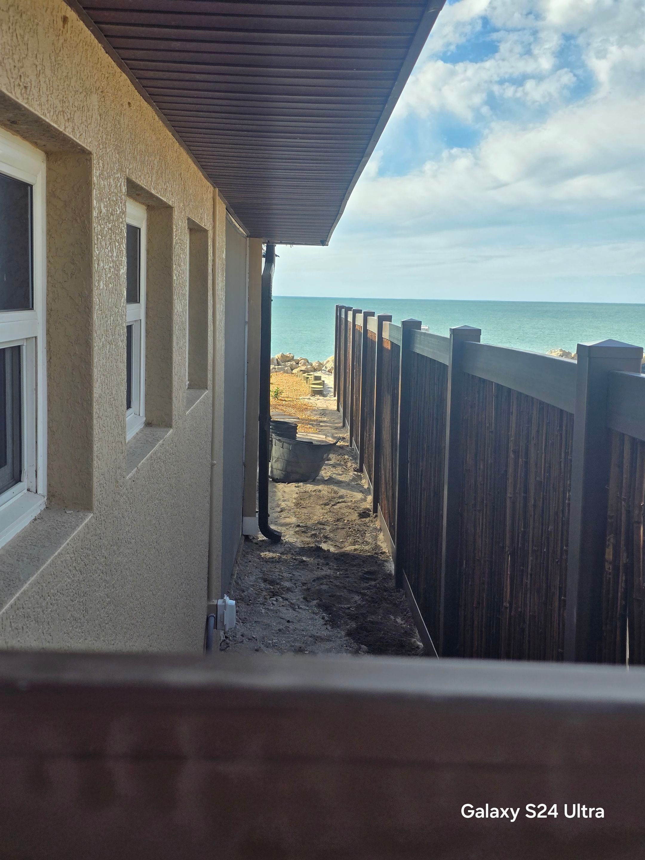 Custom Bamboo Vinyl Fence in Manasota Key by True Fence LLC