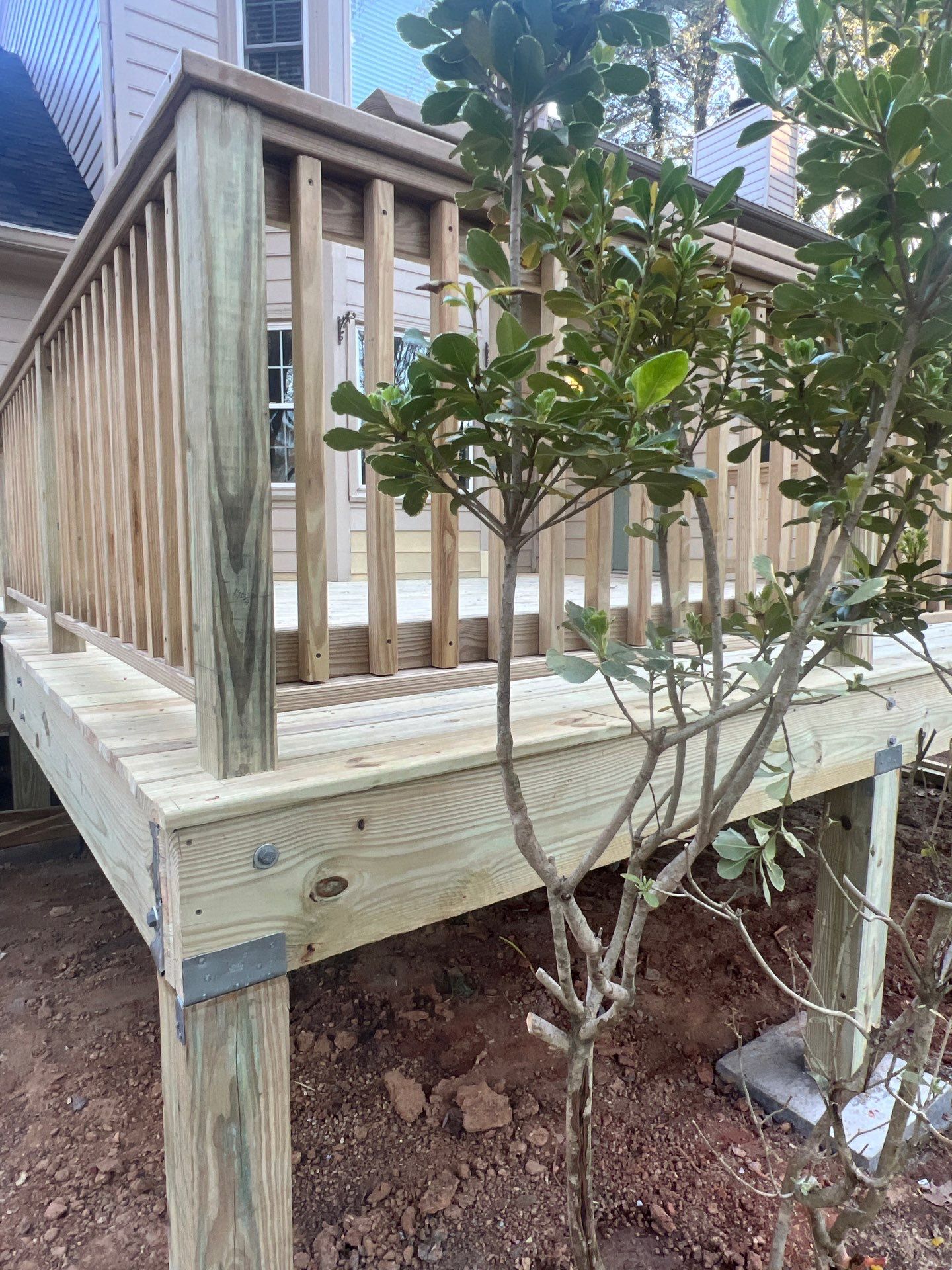 Deck Installation using Pressure Treated Pine in Peachtree Corners, GA by Nelson Exteriors 