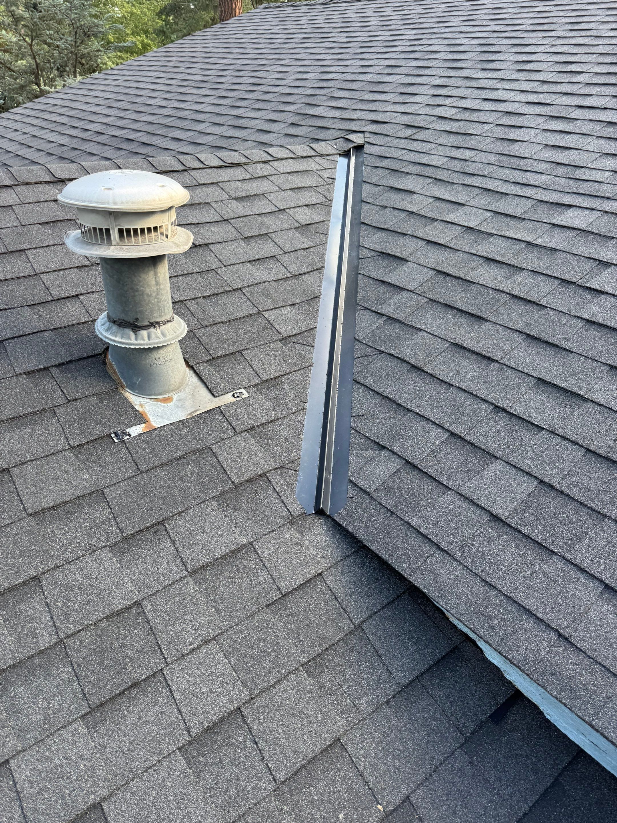 Architectural Shingle Roof Replacement West Appaloosa Road Coeur d'Alene, ID 83815 The Cascade System - CertainTeed Landmark® Shingle- Moire Black by Alpine Roofing