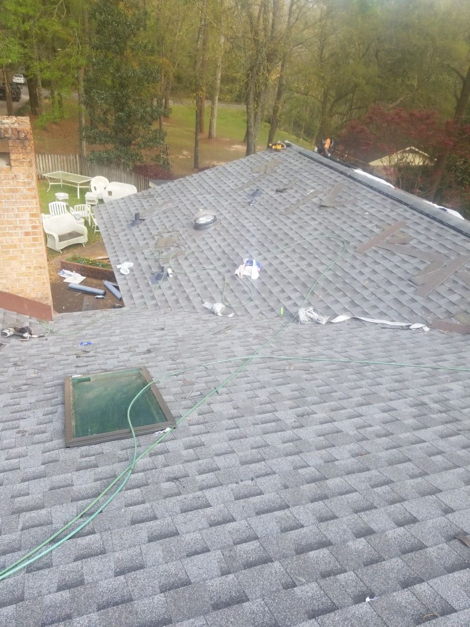 Residential Roofing Installation using Roof Replacement by American Roofing & Construction LLC