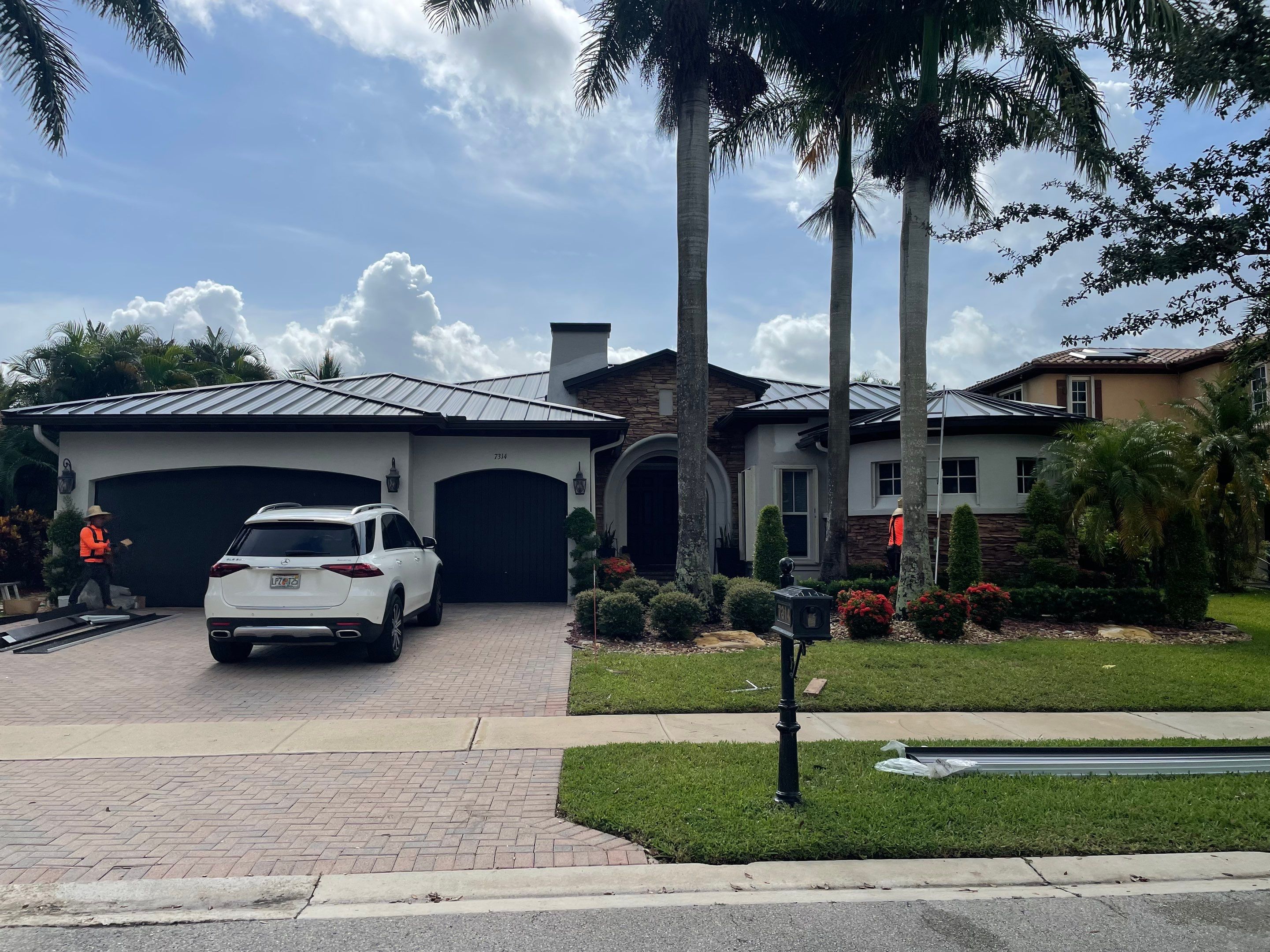 24ga 1.5" Mechanical Seam Dark Bronze by Total Roofing System The Metal Roof Experts