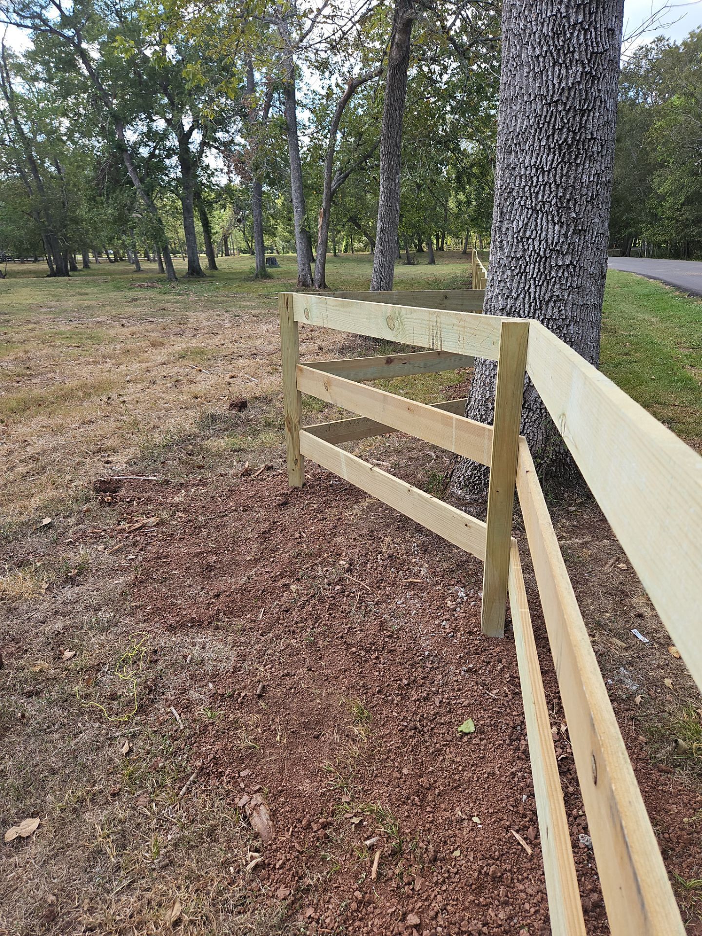 Ranch Style fence Plus Iron installation by Tim's Fences