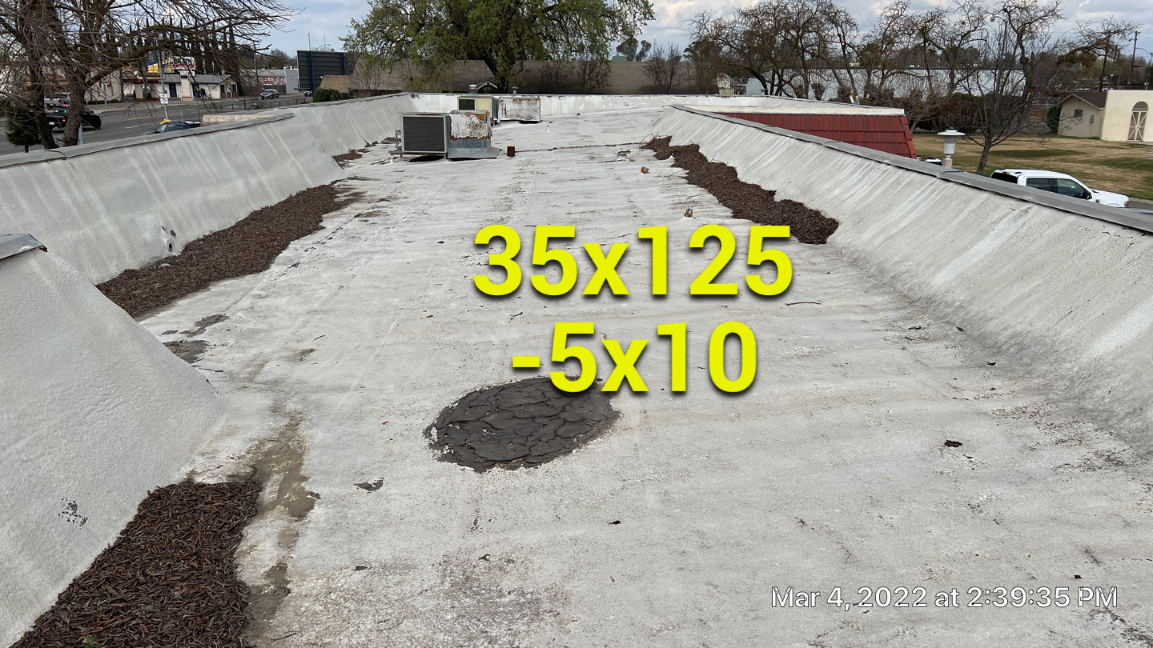 Commercial Roofing Installation using General Coatings acrylic coatings and spray foam by Straight Edge Roofing Inc