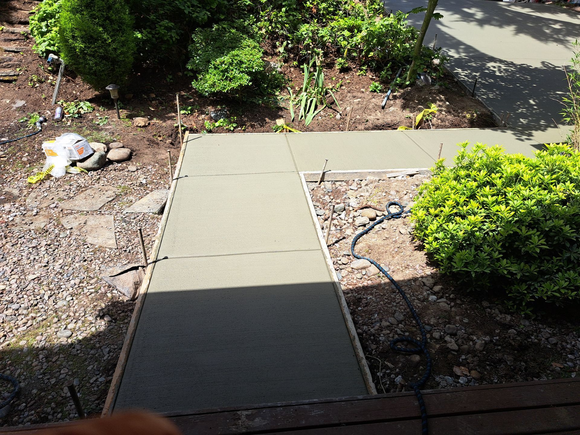 Kate | Concrete Driveway & Walkway by Jireh Asphalt & Concrete Inc 