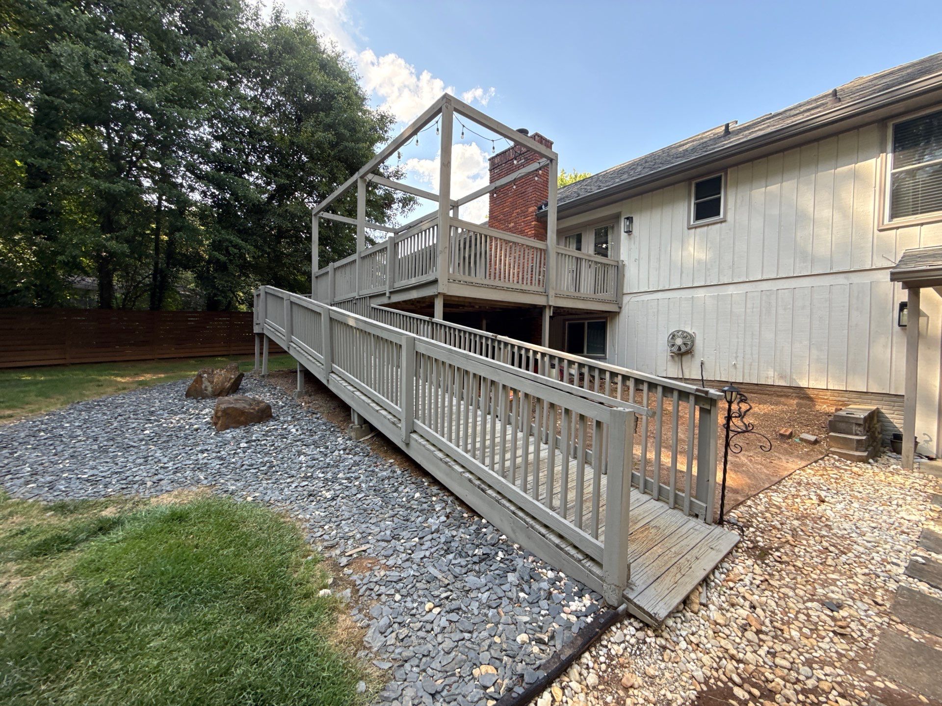 Deck and Shed Roof Style Covered Build using Trex Decking Products by Nelson Exteriors 