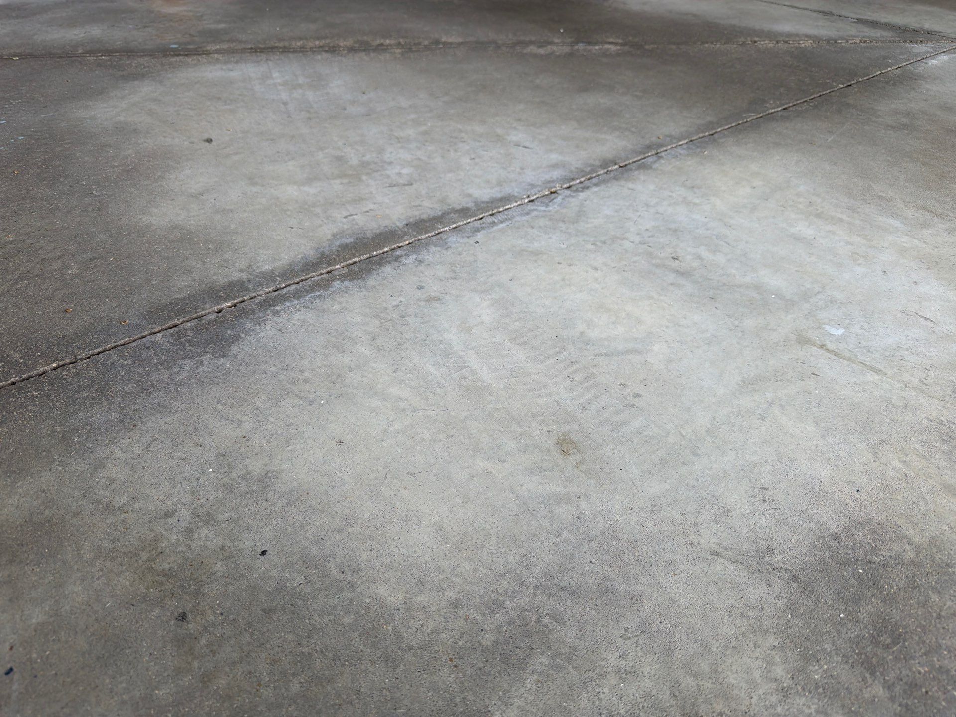Coyote Garage Floor Coating in Sioux Falls by Select Painting, Coatings & Garage Cabinets