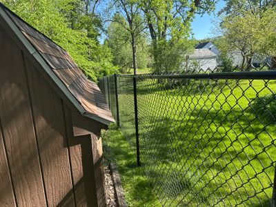 Black Chain Link Fence and Driveway Gate Installation in Waterloo