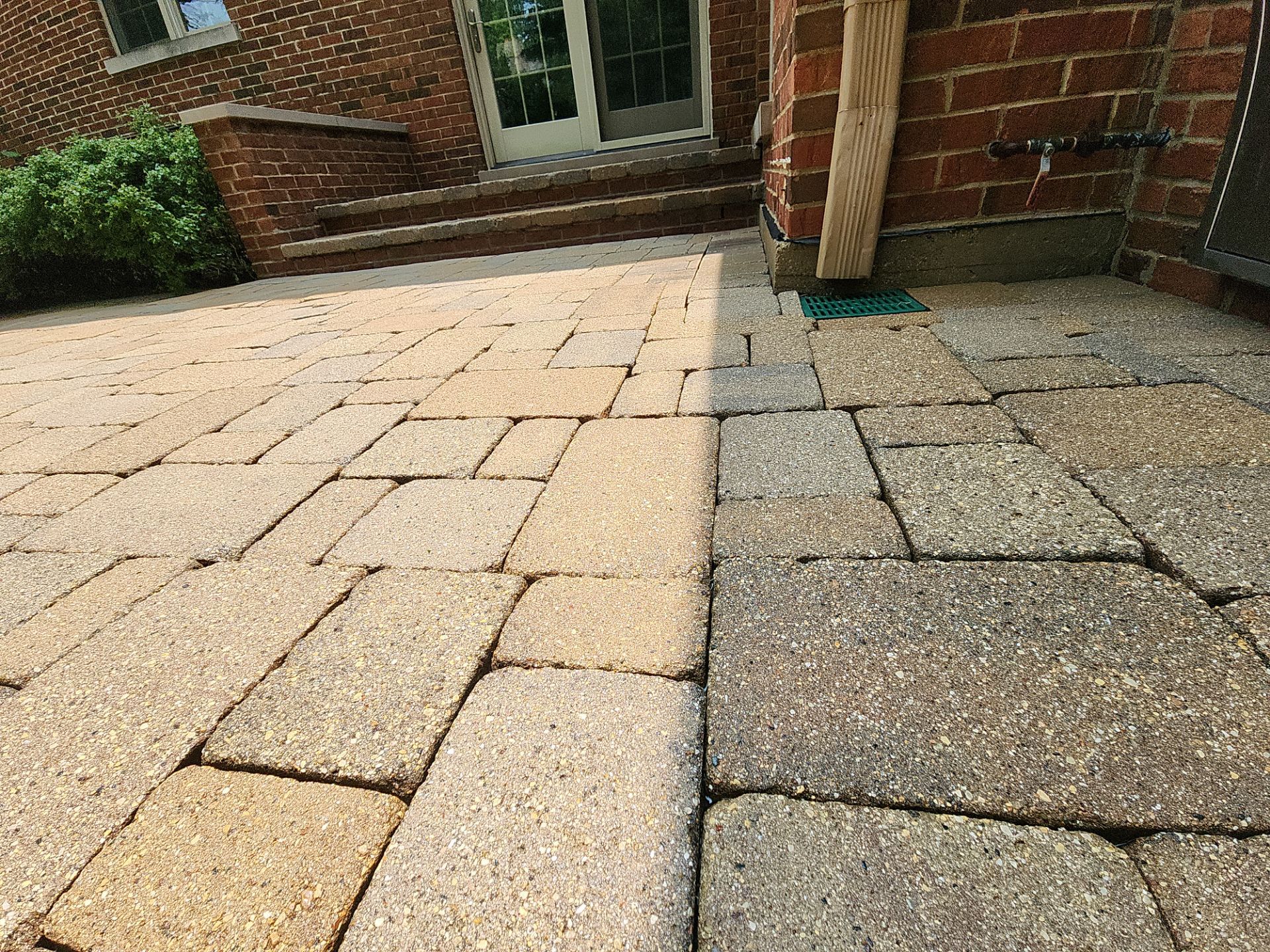 Brick paver repair, clean, seal and poly sanding by Northern Power Washing LLC.