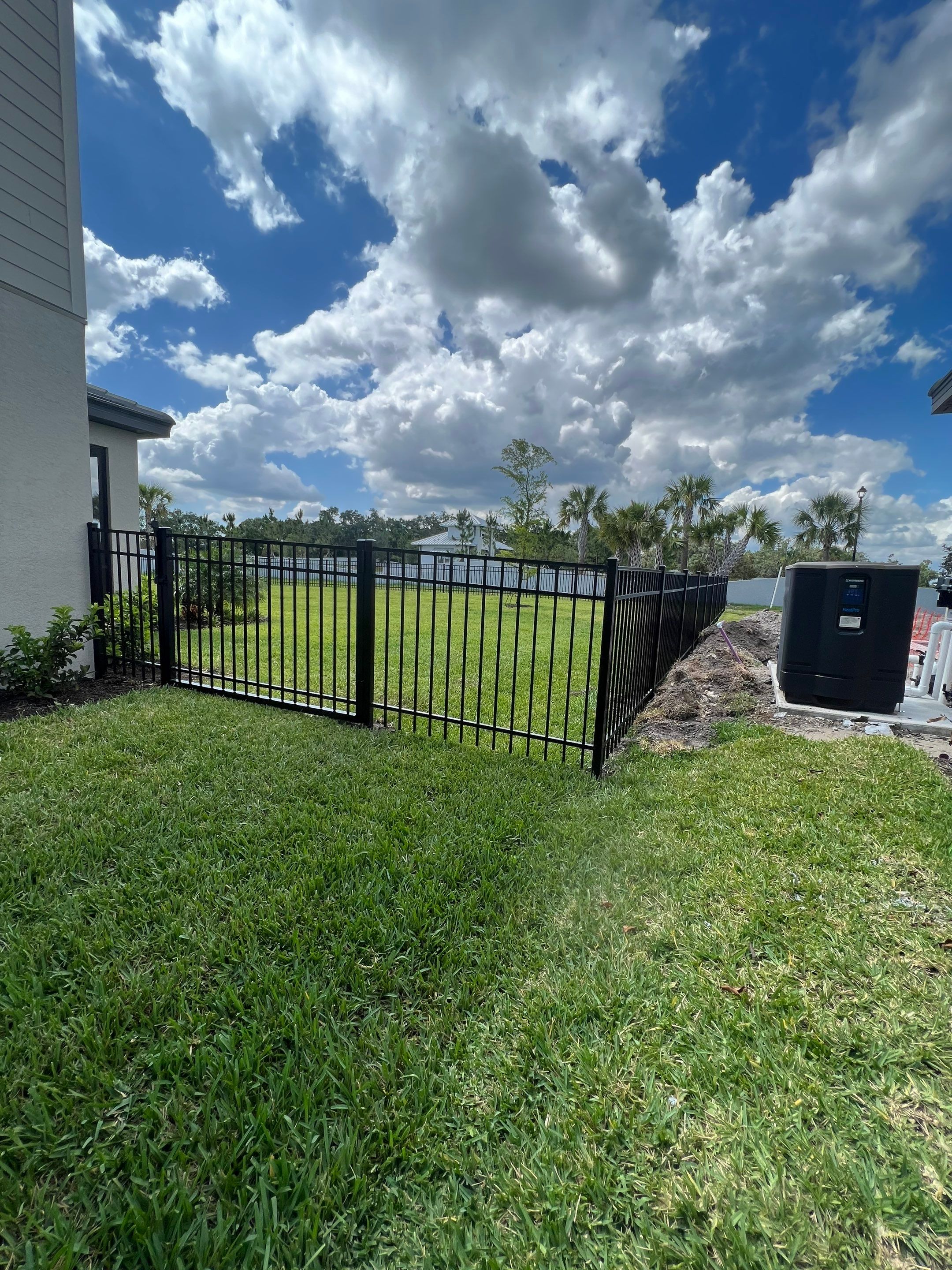 Aluminum Fence Installation using Black 3 Rail Aluminum Fence by Asap fence and gates, LLC