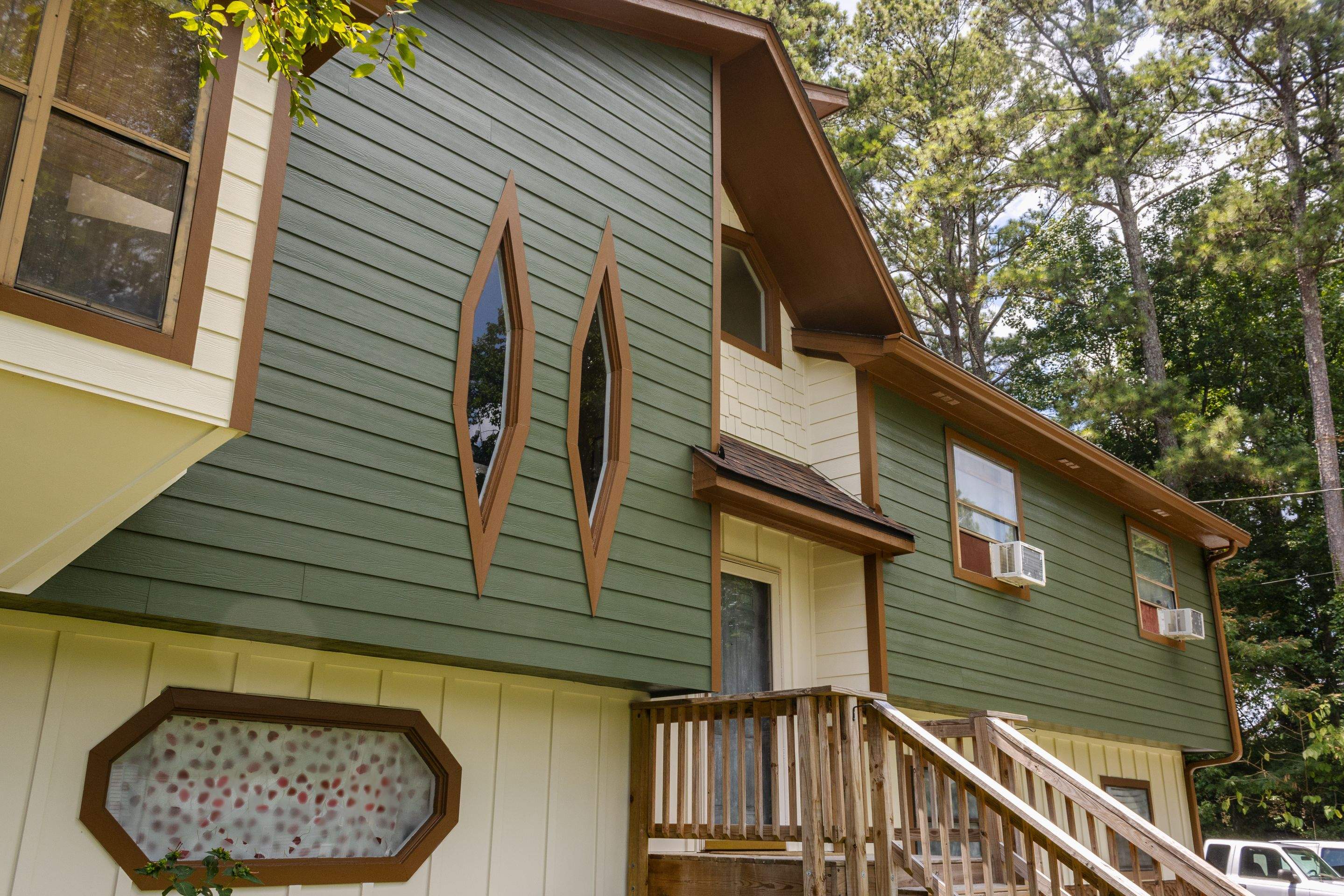 Snellville,GA Siding Replacement and Multi-Colored Exterior Painting by Nelson Exteriors