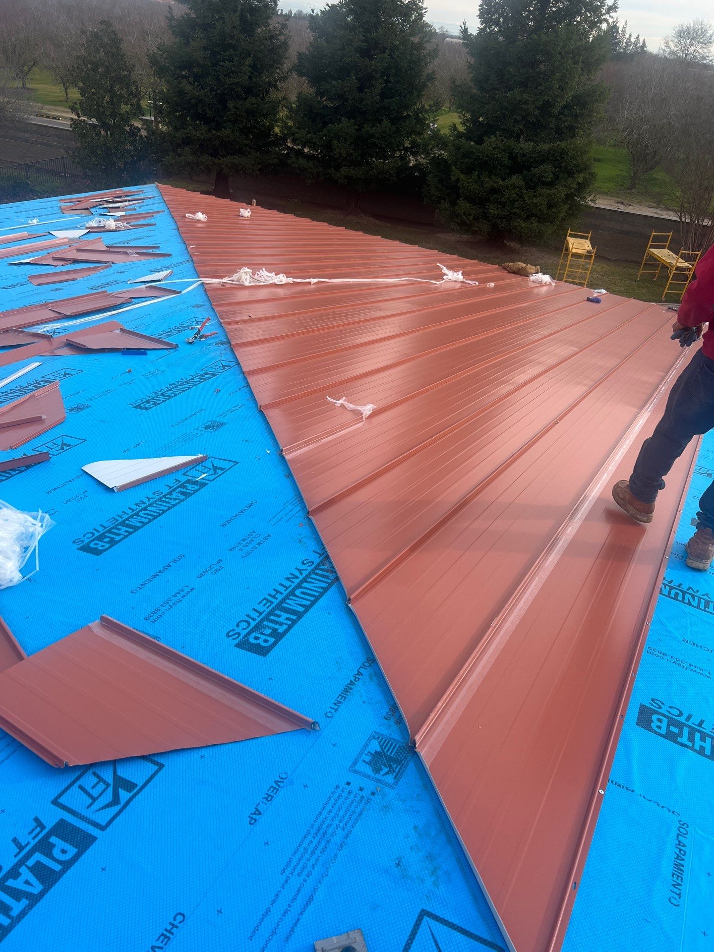 Tile, Metal, and TPO roofing project (new construction) by Straight Edge Roofing Inc