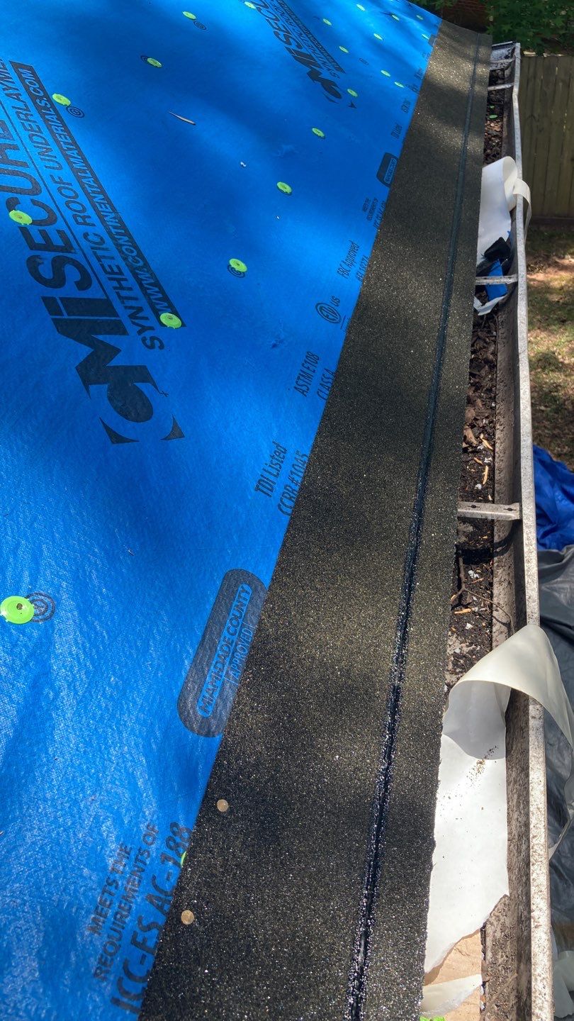 Residential Roofing Installation using Roof Replacement by American Roofing & Construction LLC