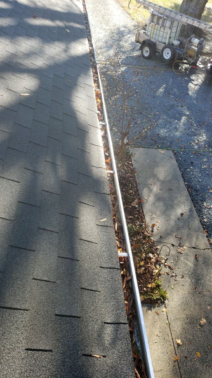 gutter cleaning and house wash and gutter guard installation by Power Wash Masters LLC