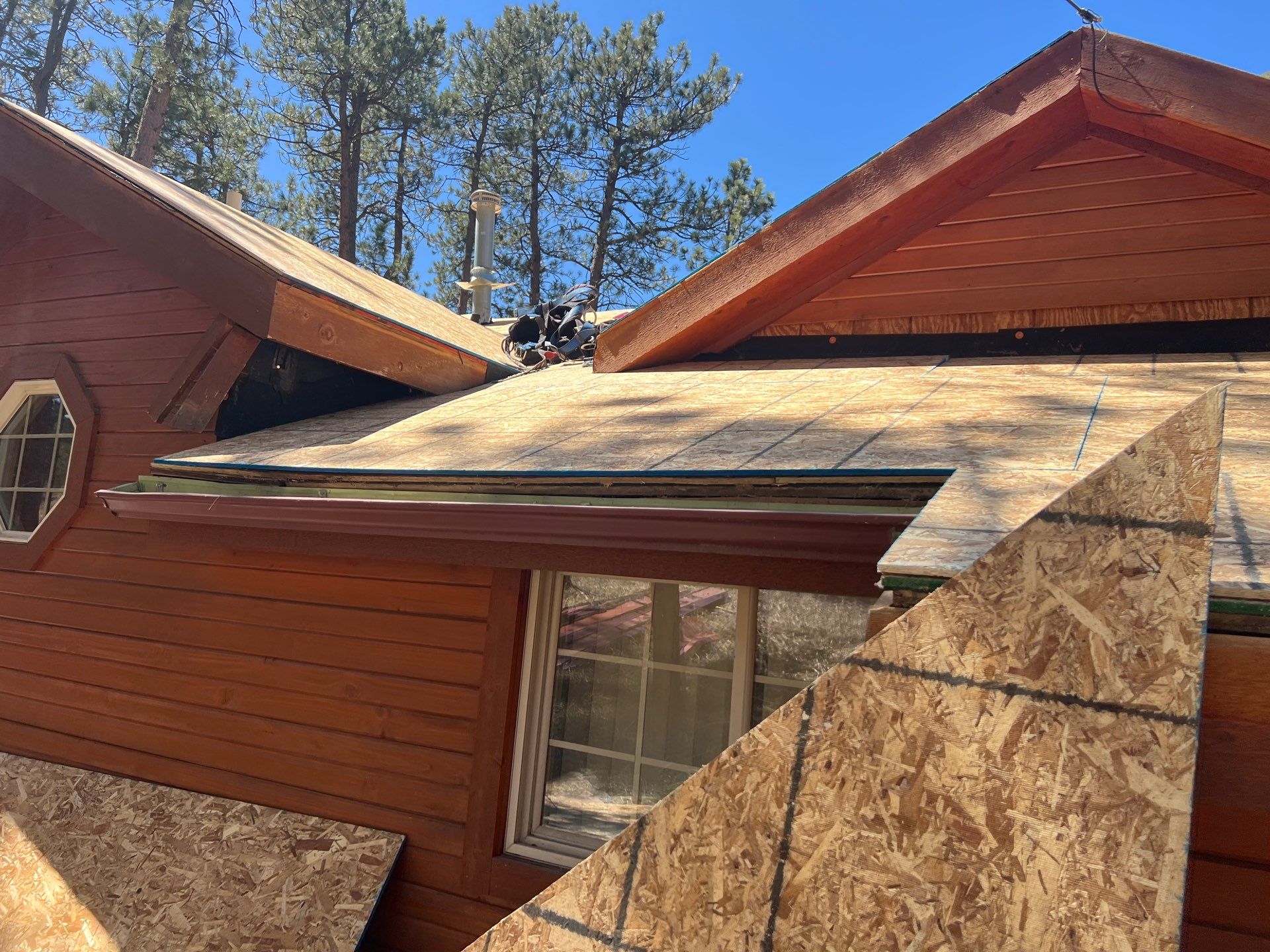 Residential Roofing Installation using Standing Seam Metal by Blue Peaks Roofing LLC 