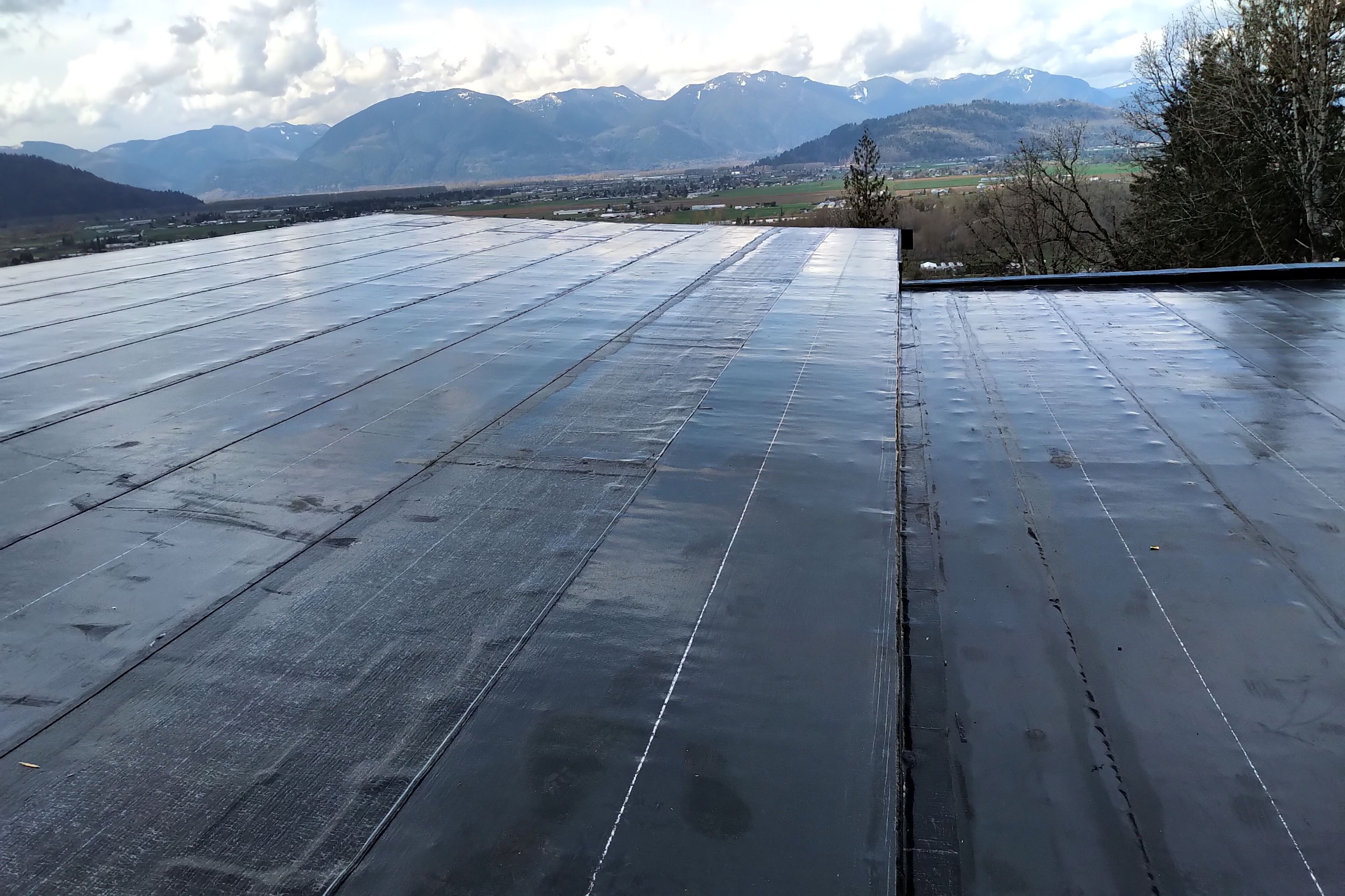 Residential Roofing Installation using IKO 2ply sbs  by Top Notch Roofing Inc