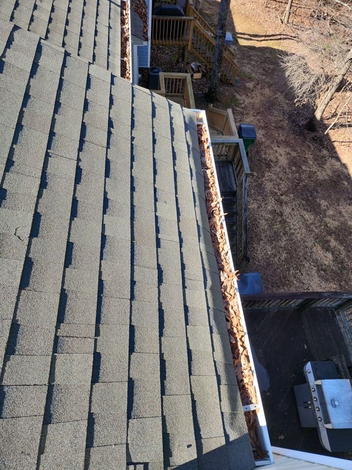 Gutter Cleaning using water by Power Wash Masters LLC