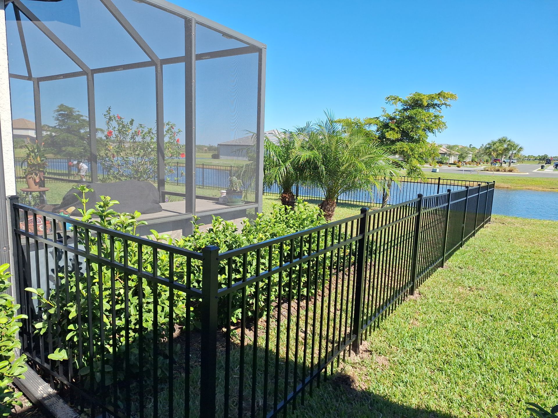 Aluminum Fence Installation using 4ft 3 Rail Black Aluminum Fence by Asap fence and gates, LLC