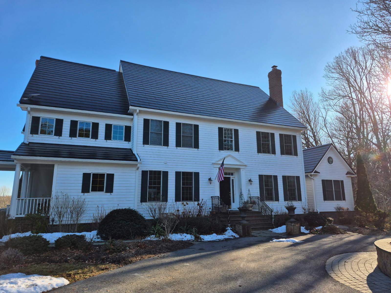 Tesla Solar Roof  using Tesla Powerwall by American Home Contractors