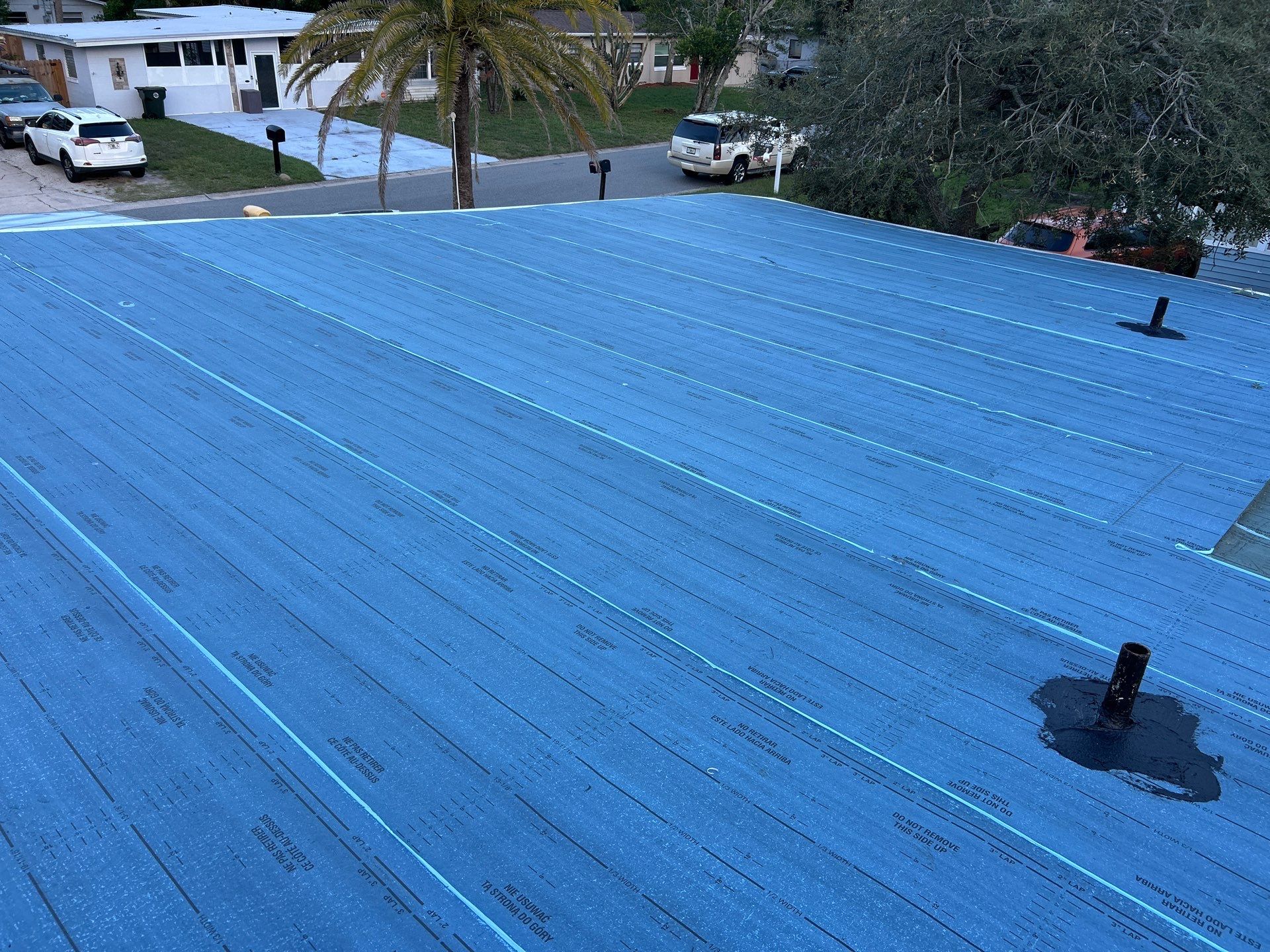 Colonial Slate Modified Bitumen Flat Roof Replacement in Daytona Beach by Pinnacle Roofing Group