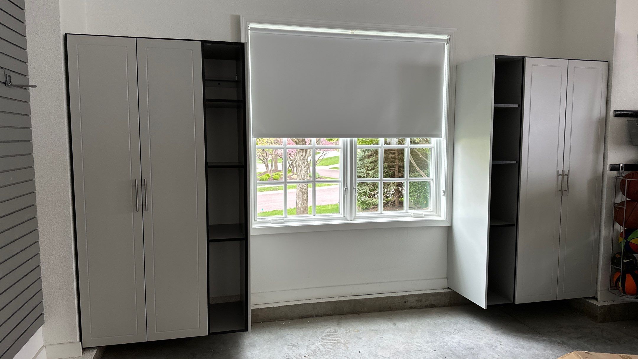 Brooke L. added cabinets for a clean storage look by Banner Garage