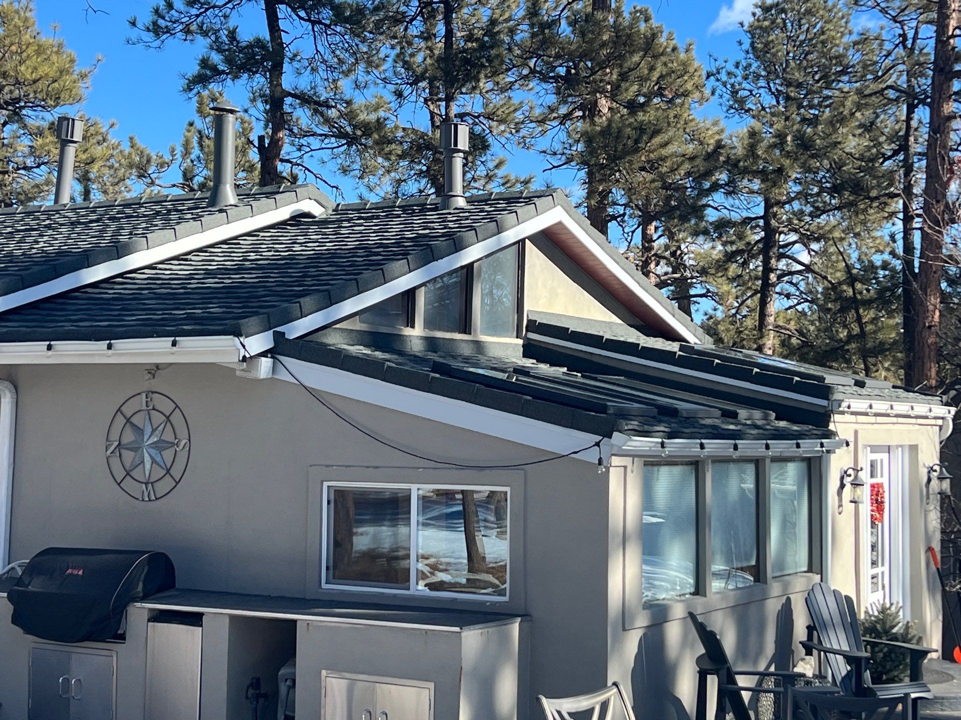 Residential Roofing Installation using Stone Coated Steel by Blue Peaks Roofing LLC 