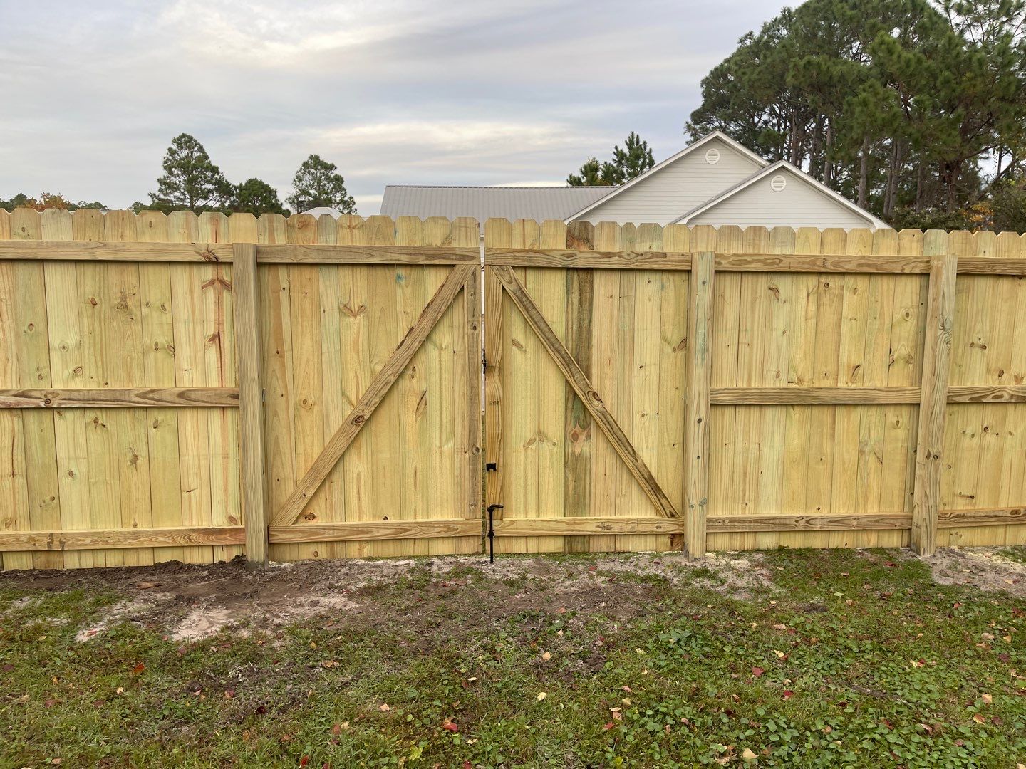 6' WOOD PRIVACY WITH 14' DOUBLE DRIVE GATE using PRESSURE TREATED PINE by Hip Square Fence Inc.
