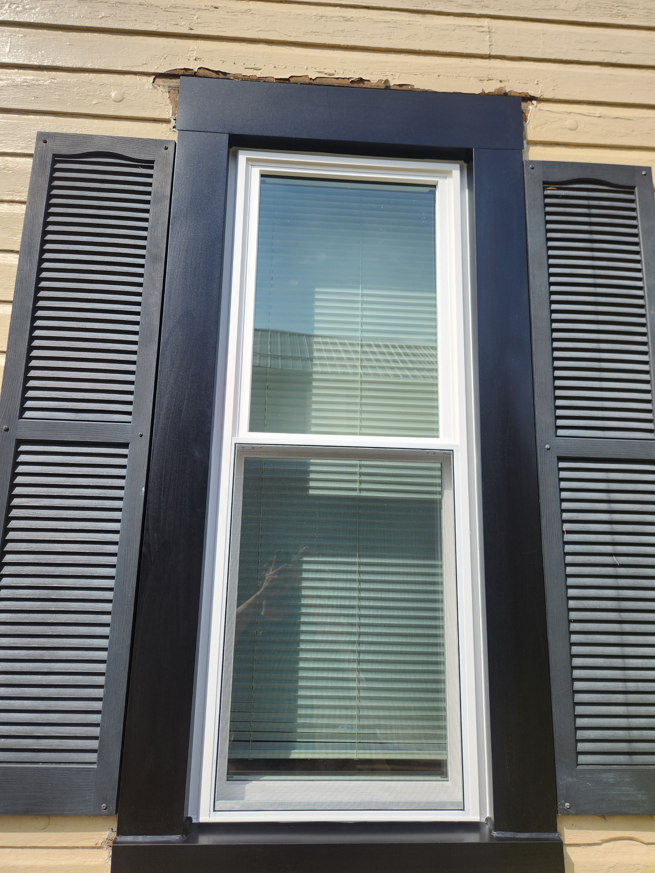 Vinyl Window Replacement and Black Shutter Installation in Dennison by Ohio State Windows