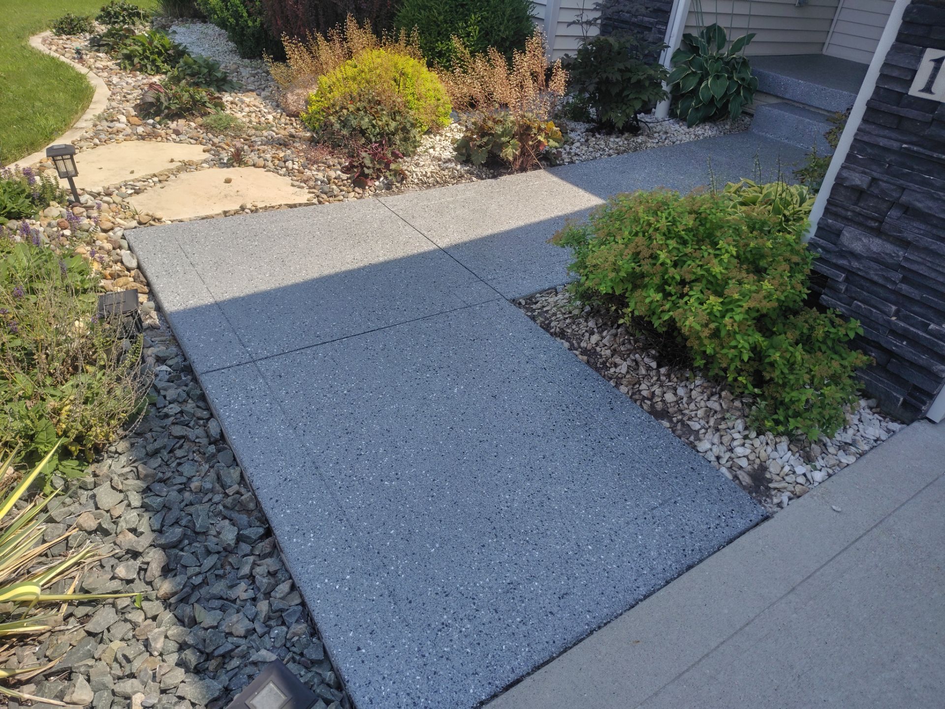 Residential Garage and Front Entry Concrete Coating in Nevada, Iowa by Revival Concrete Coatings