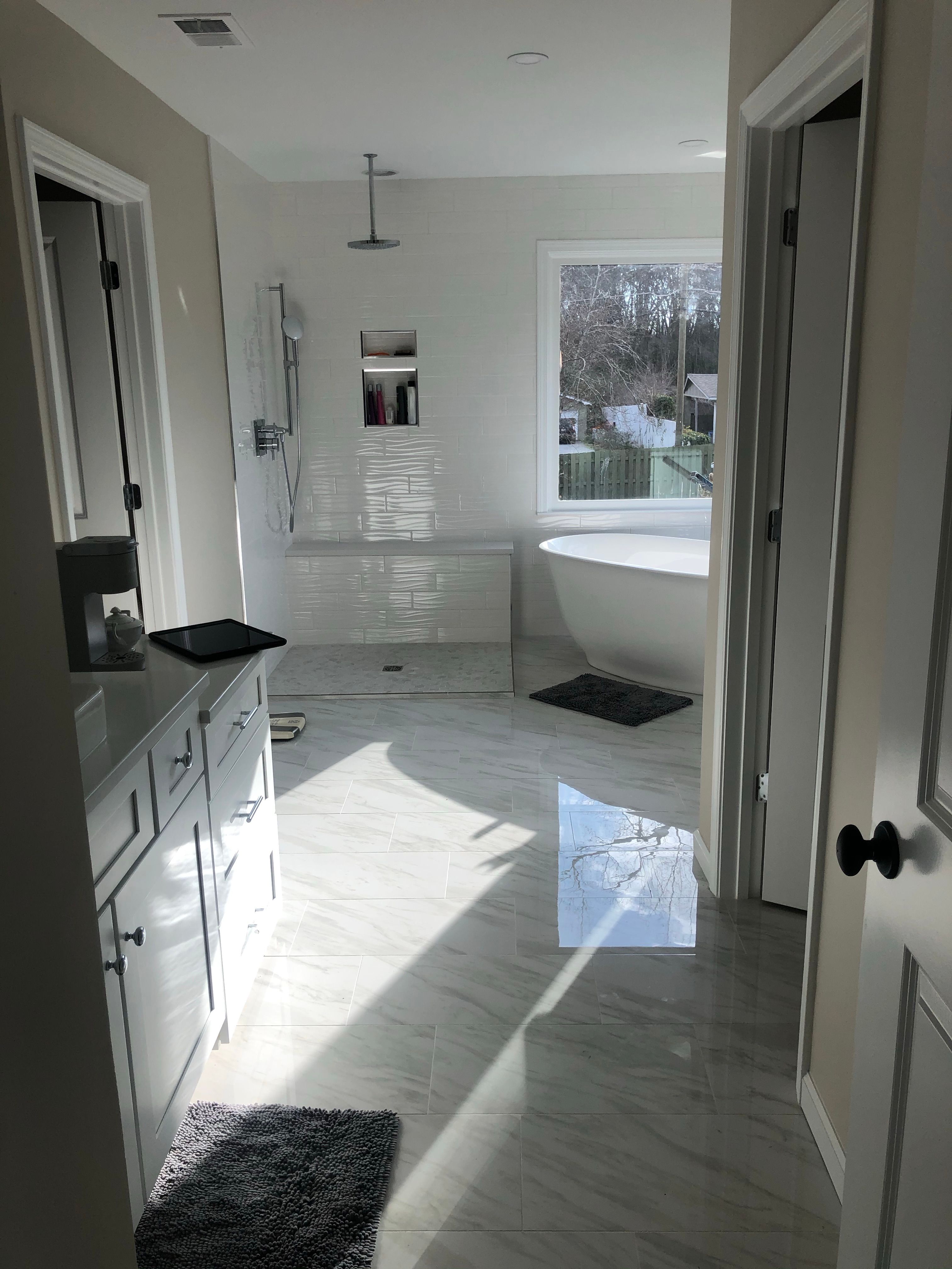 Modern Bathroom Remodel With Freestanding Tub In Marietta by Swift Home Renovations