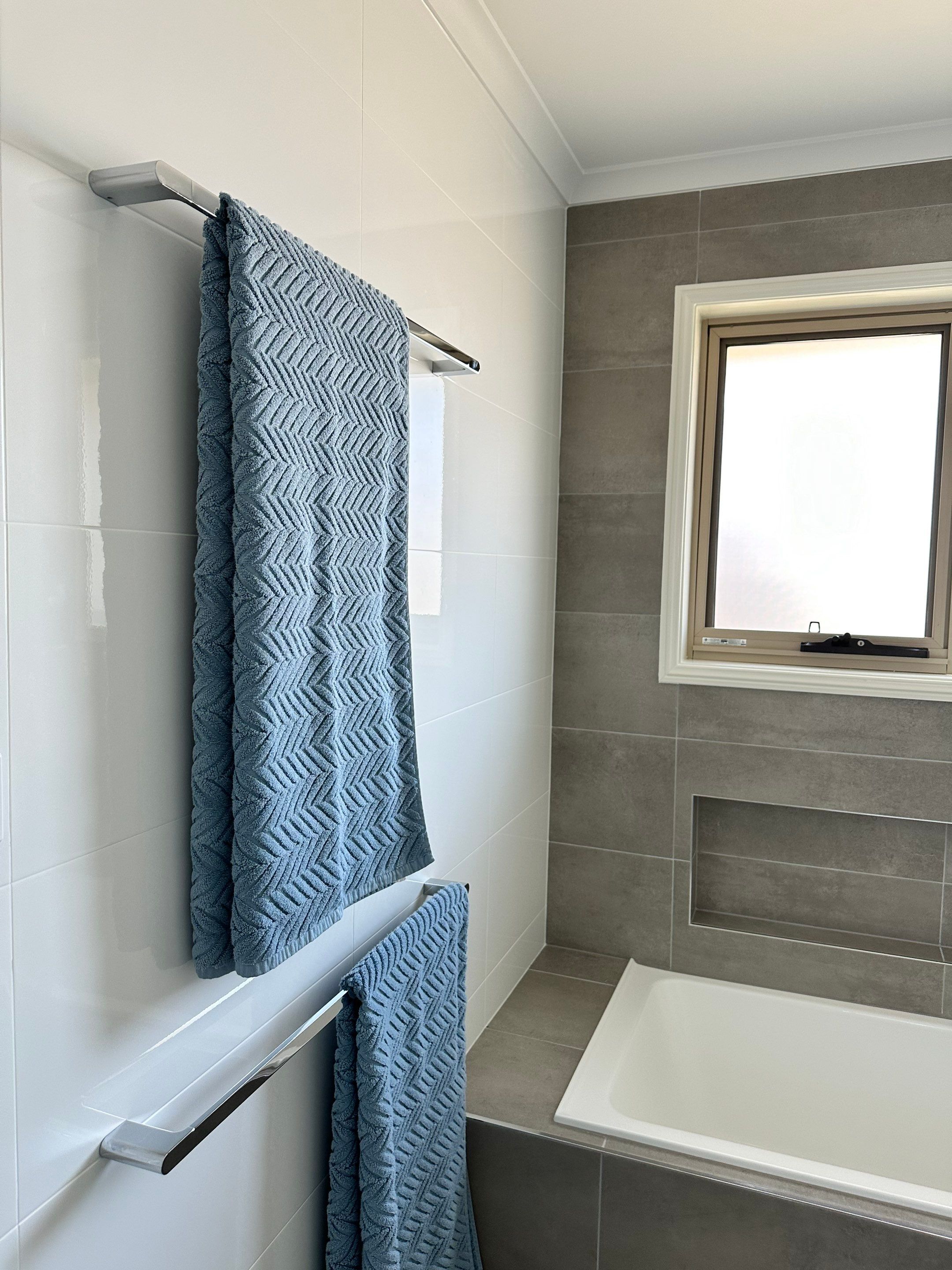 Main Bathroom, Ensuite, Toilet, Powder Room, and Laundry Renovation by Re-seal Bathrooms