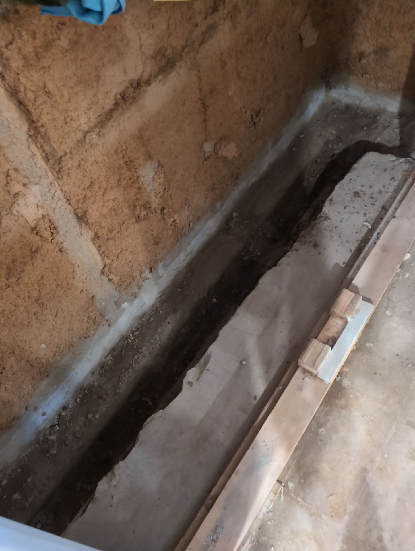Interior Basement Waterproofing System and Egress Window Installation by Toledo Basement Repair 