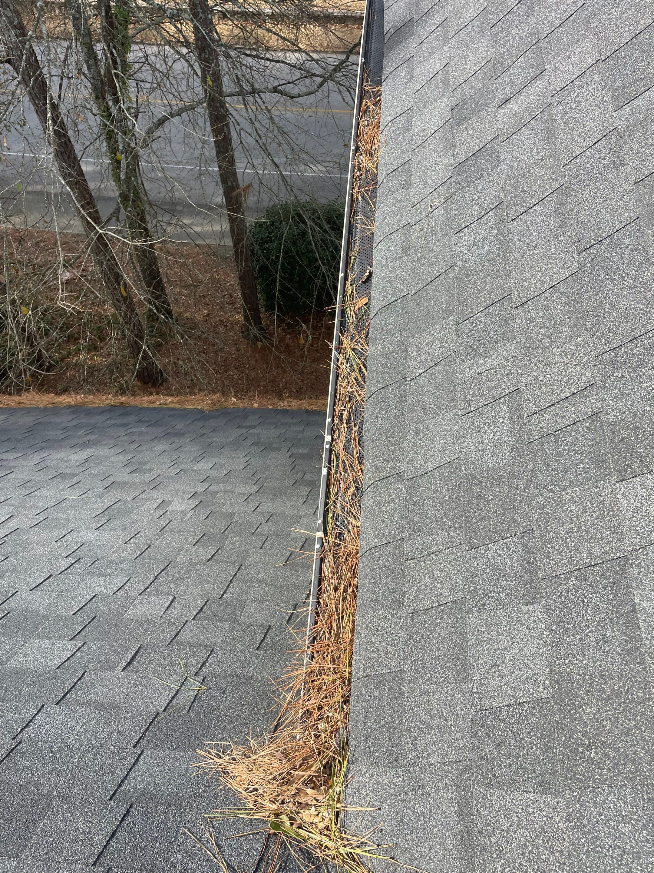 Cleaning Gutters  by Deerfield Roofing LLC