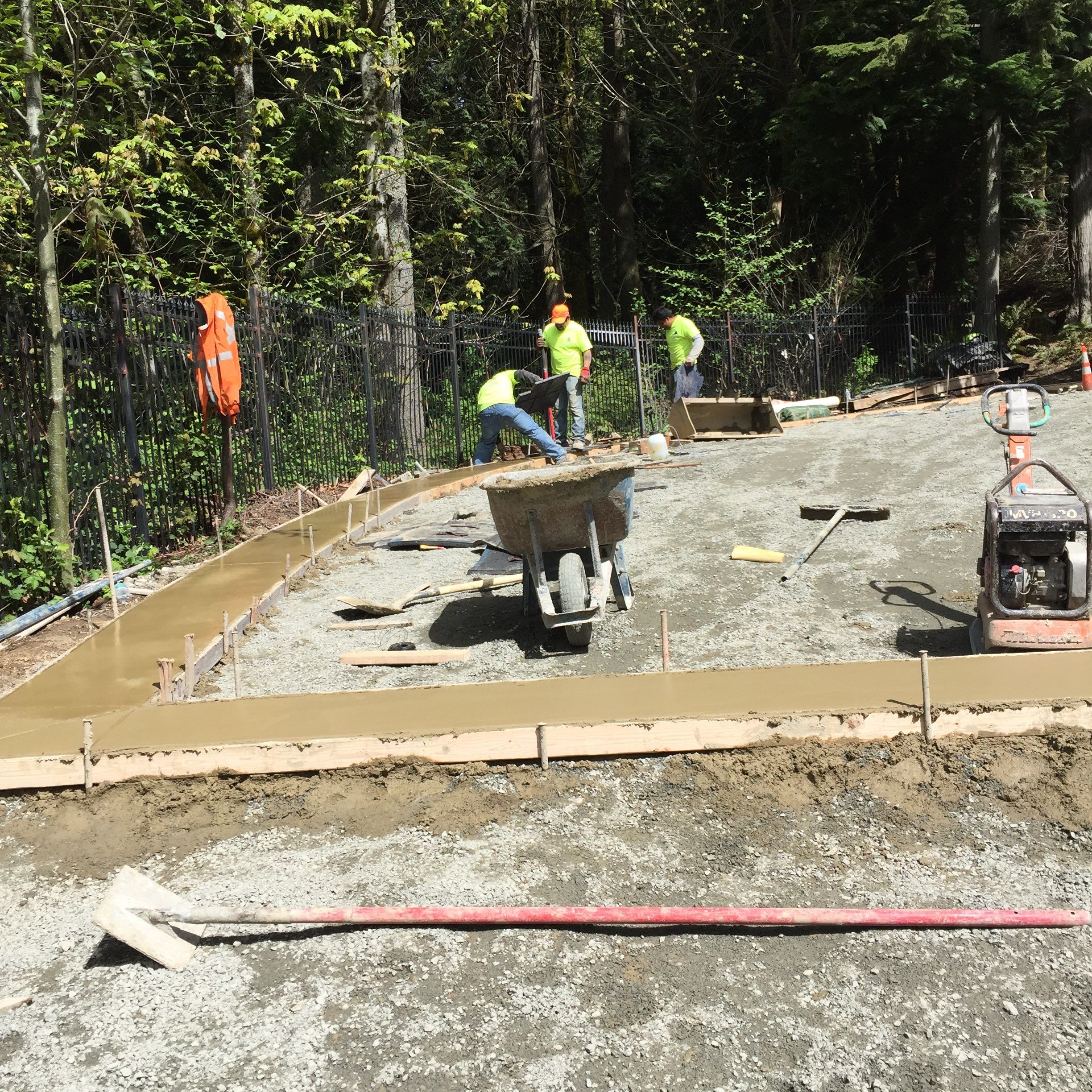 Asphalt Driveway and Stamped Concrete Patio Finish  by Jireh Asphalt & Concrete Inc 