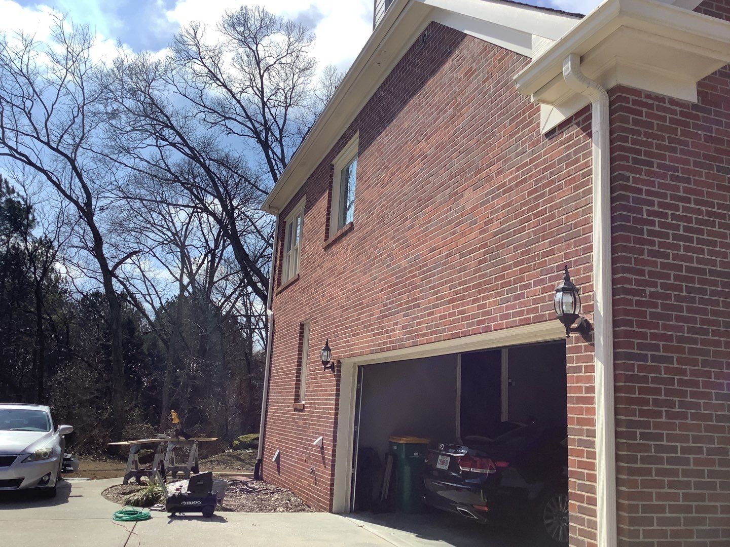 White Brick Exterior Painting and Deck Refinishing in Duluth by Swift Home Renovations