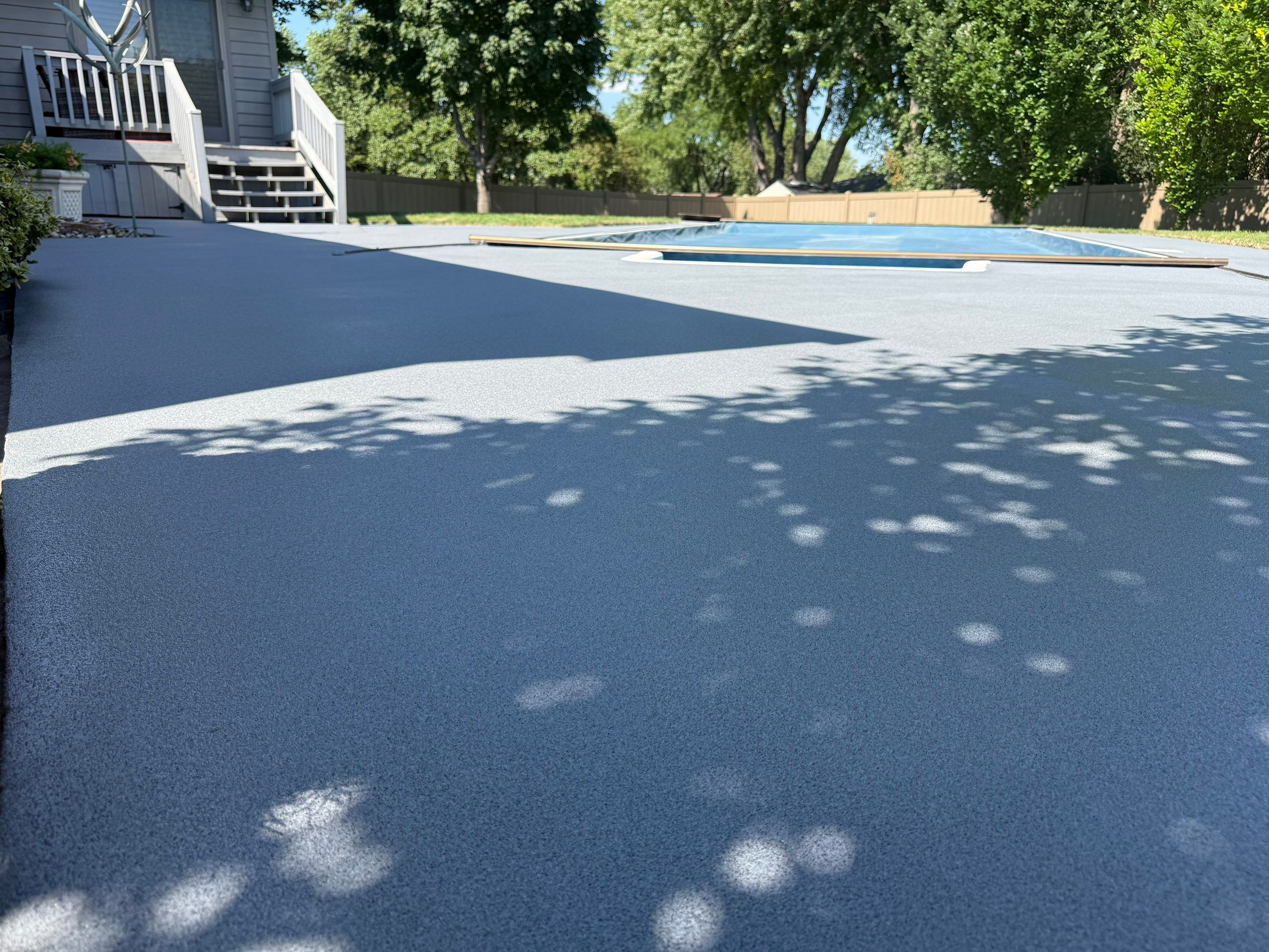 Residential Pool Deck Resurfacing in Sioux Falls by Select Painting, Coatings & Garage Cabinets