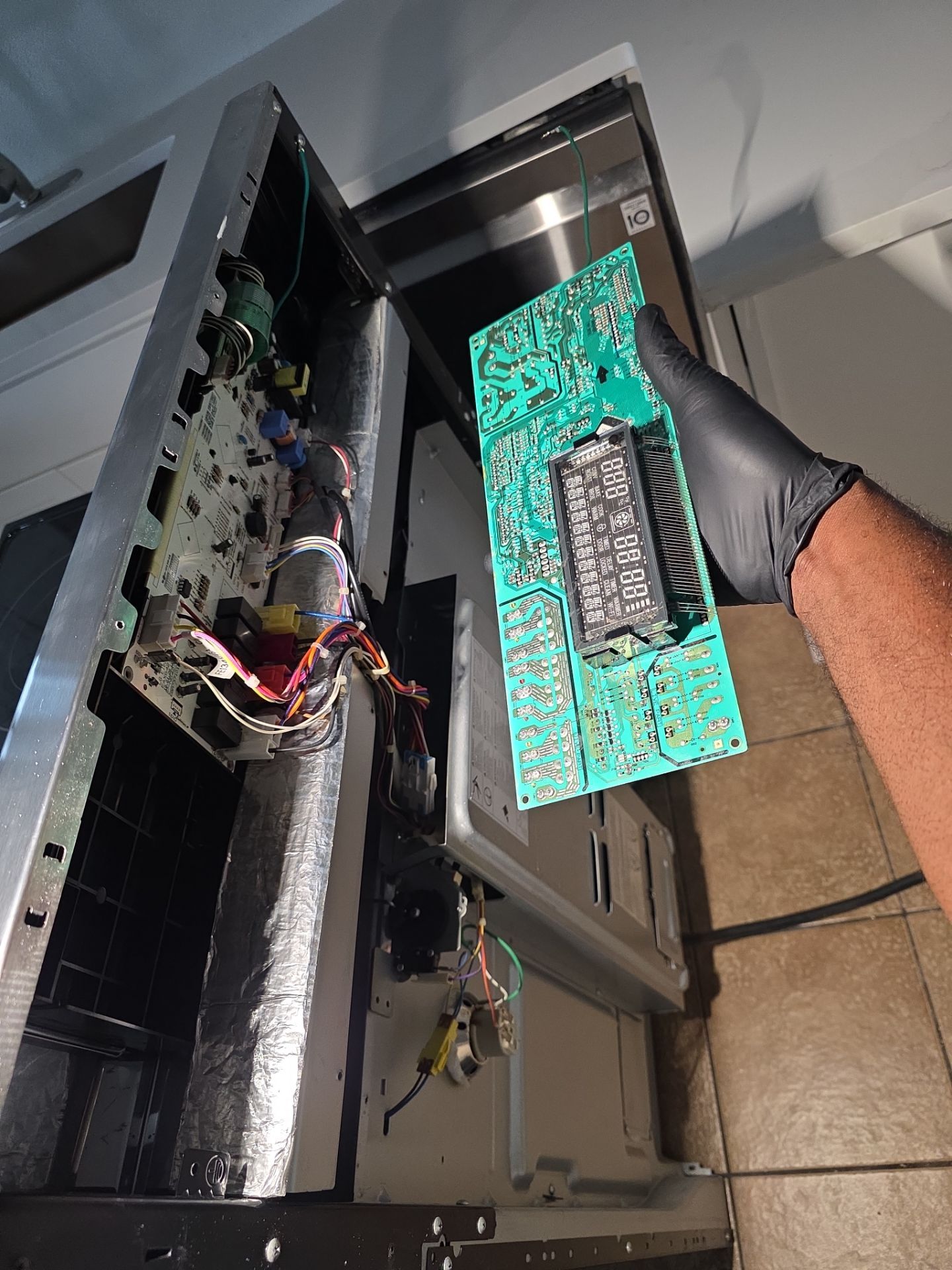 LG Refrigerator Cooling Repair and Electric Range Control Board Replacement by AMB-WORKS APPLIANCE REPAIR