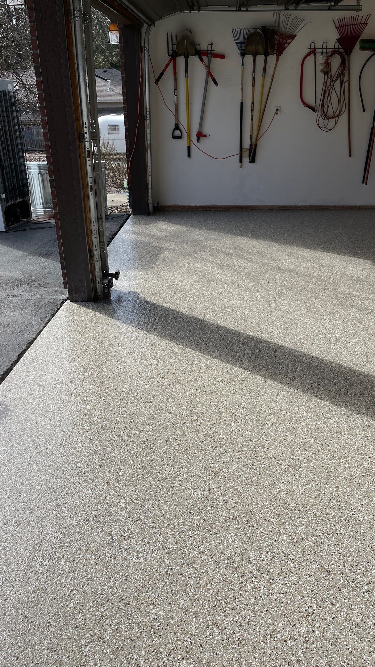 Garage Floor Polyaspartic Coating with Pebble Beach 1/4" Flakes by Croc Coatings, LLC