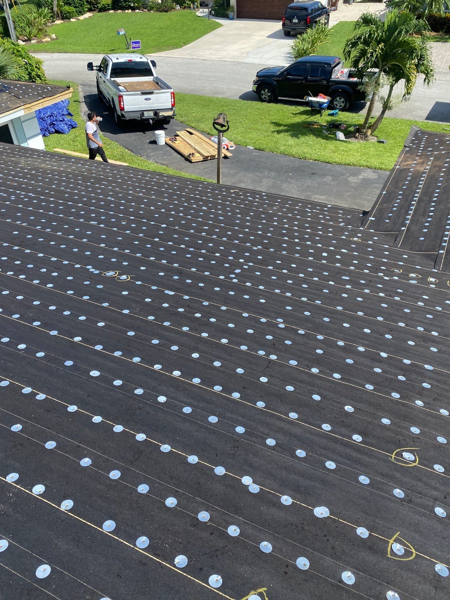 Residential Roofing Installation using 1" Nail strip metal roof by BLUES BROTHERS ROOFING