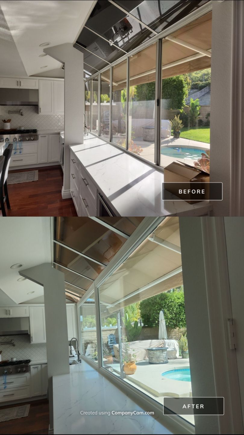 Window Installation using Anlin vinyl windows with Sunshield glass by American Window Company