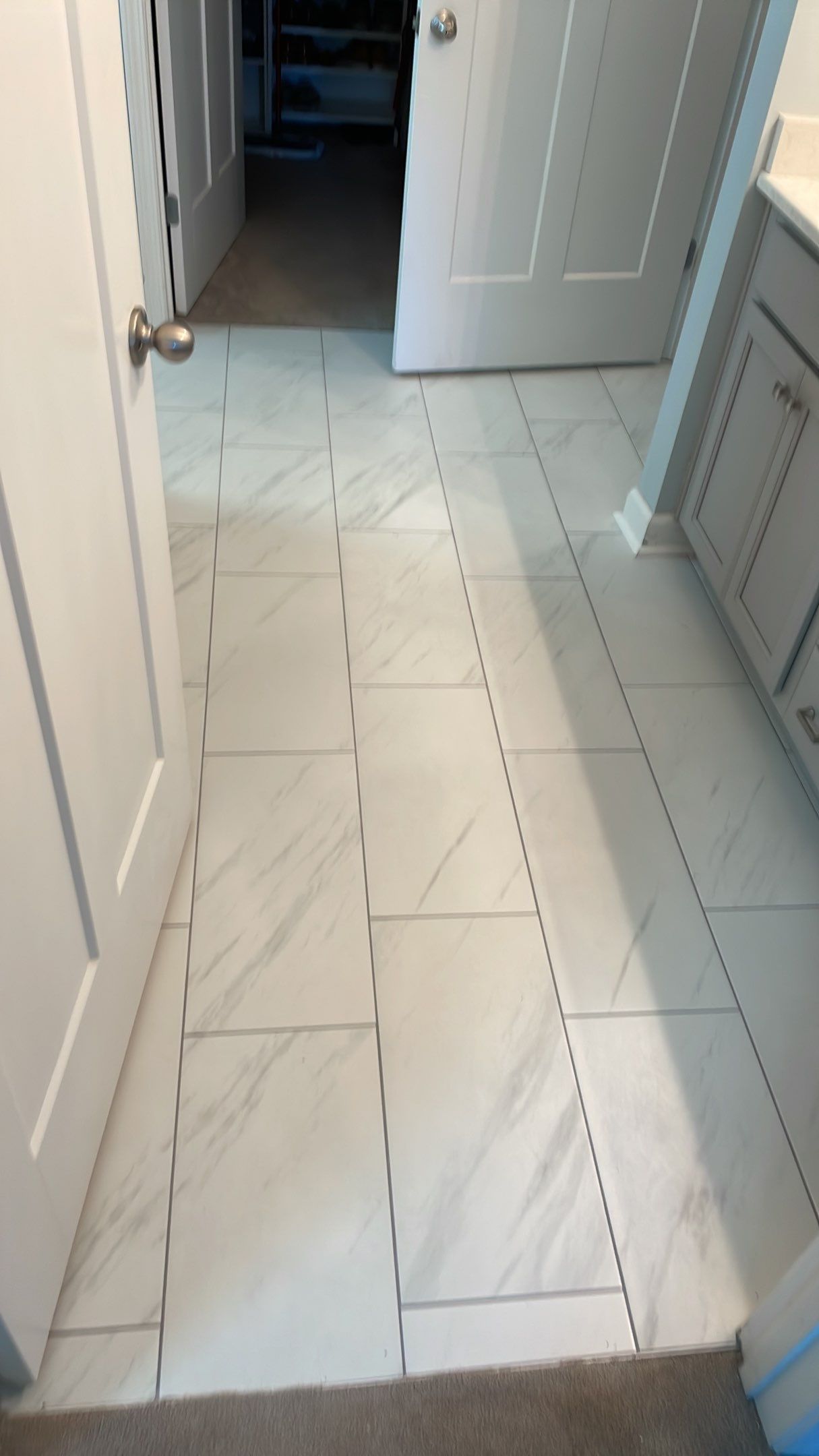 Bathroom Remodel using Decorative Tile by Footprints Floors of Coastal Carolina