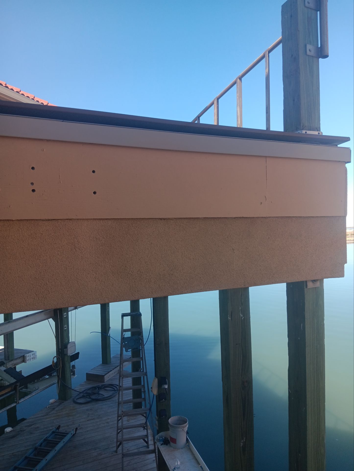 Waterfront Walkout Waterproofed! by Bayfront Roofing and Construction